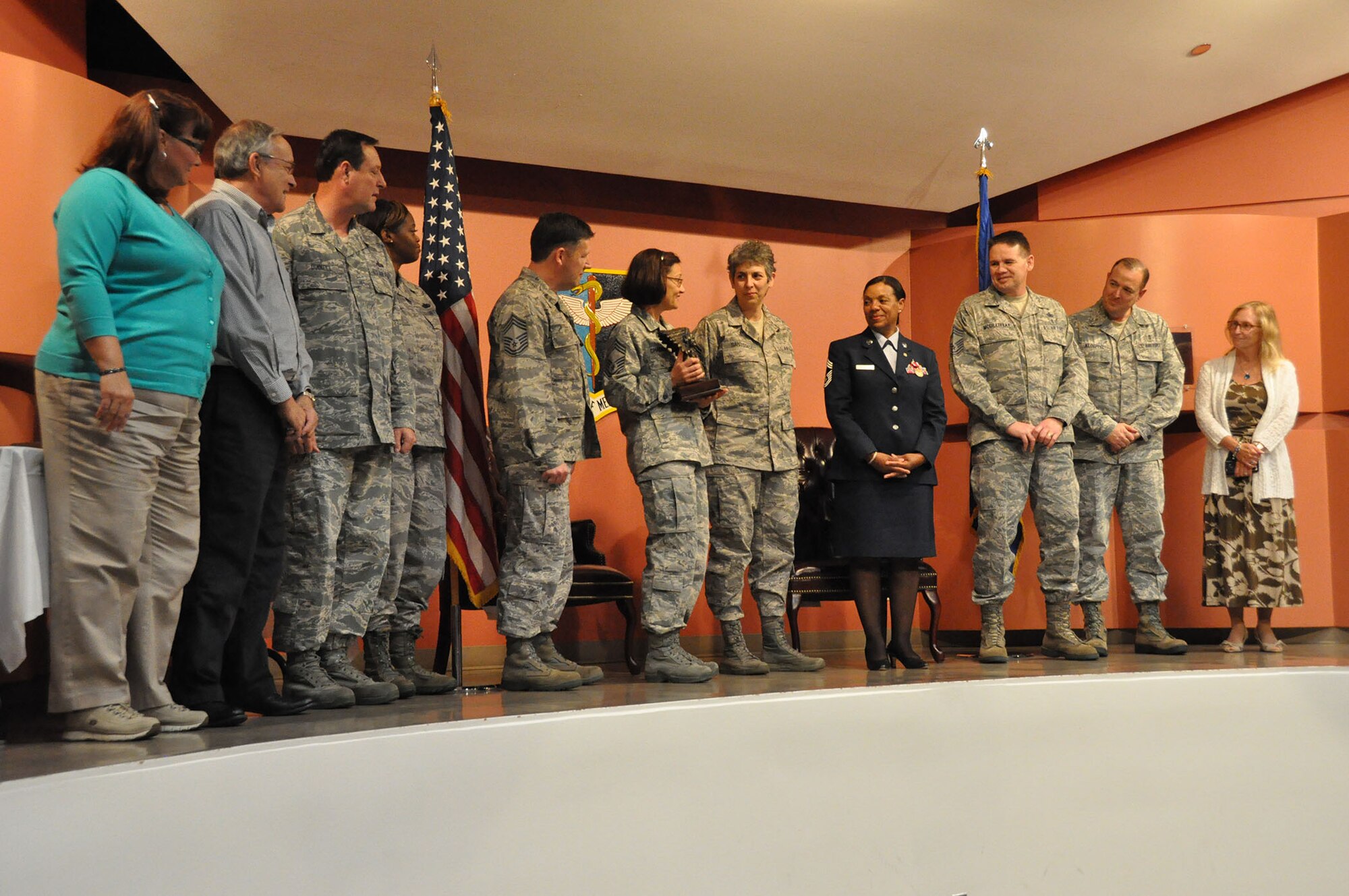 TRAVIS AIR FORCE BASE, Calif. -- After more than 33 years of faithful service to her country, Chief Master Sgt. Denise P. Butler, Superintendent, 349th Aerospace Medicine Squadron, celebrates her many years of service during a ceremony held in her honor at Travis Air Force Base, Calif. on April 7, 2013. (U.S. Air Force photo / Senior Airman Amelia Leonard) 