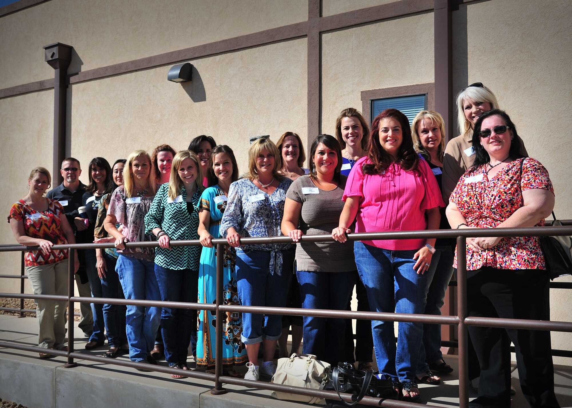 Senior leaders’ spouses of the 27th Special Operations Wing gather in front of the 551st Special Operations Squadron during a tour of Cannon Air Force Base, N.M., May 14, 2013. Visiting spouses were able to gain a concise understanding of how various squadrons contribute to the overall mission of the wing. (U.S. Air Force photo/Senior Airman Alexxis Pons Abascal) 