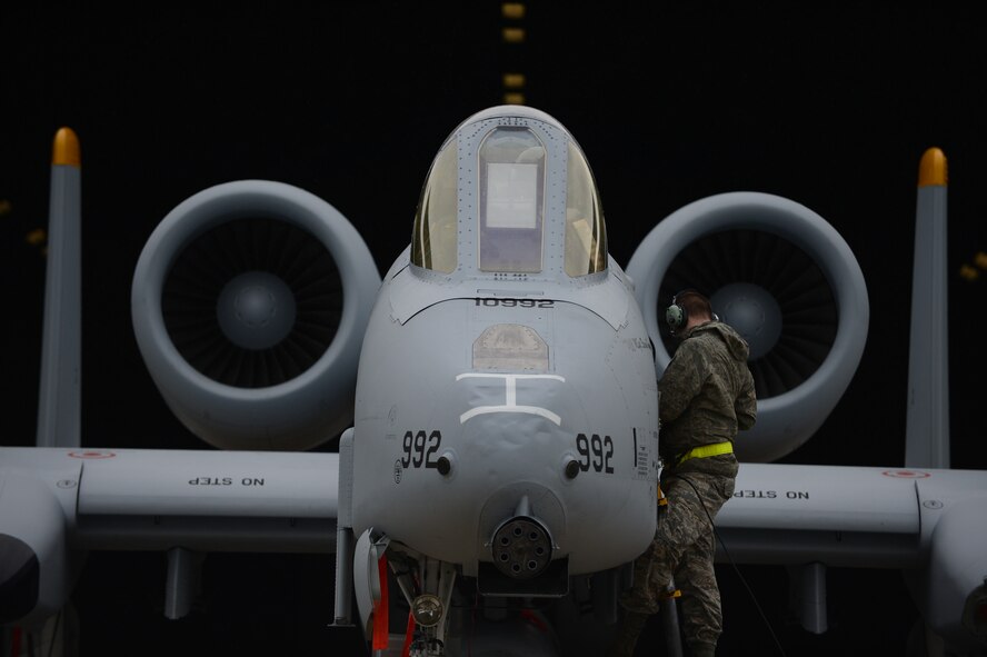 Senior Airman Christopher Nichols runs through a pre-flight inspection for an A-10 Thunderbolt II assigned to the 81st Fighter Squadron before its final take off May 17, 2013, from Spangdahlem Air Base, Germany. The 81st FS had been assigned to Spangdahlem since 1973 but is scheduled to inactivate in June. Nichols is a 52nd Aircraft Maintenance Squadron avionics technician from Warner Robins, Ga. (U.S. Air Force photo/Airman 1st Class Gustavo Castillo)