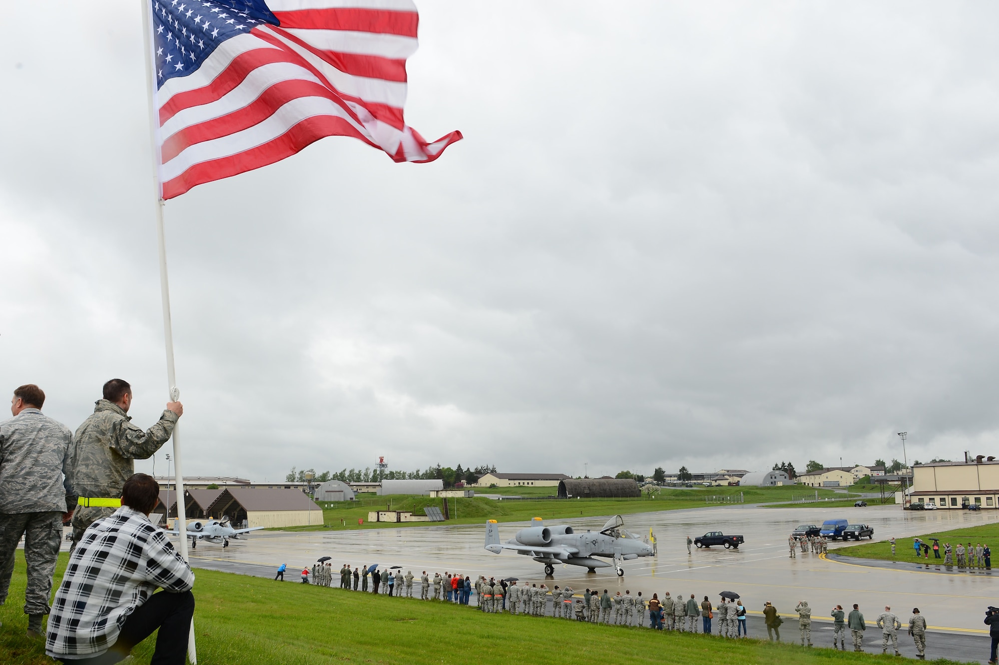 SPANGDAHLEM AIR BASE, Germany – Members of the 52nd Fighter Wing cheer on a U.S. Air Force A-10 Thunderbolt II attack aircraft before its final departure, May 17, 2013. The final four A-10s from the 81st Fighter Squadron left Spangdahlem Air Base and Europe as part of the squadron’s inactivation.  (U.S. Air Force photo by Tech. Sgt. Jonathan Pomeroy/Released)