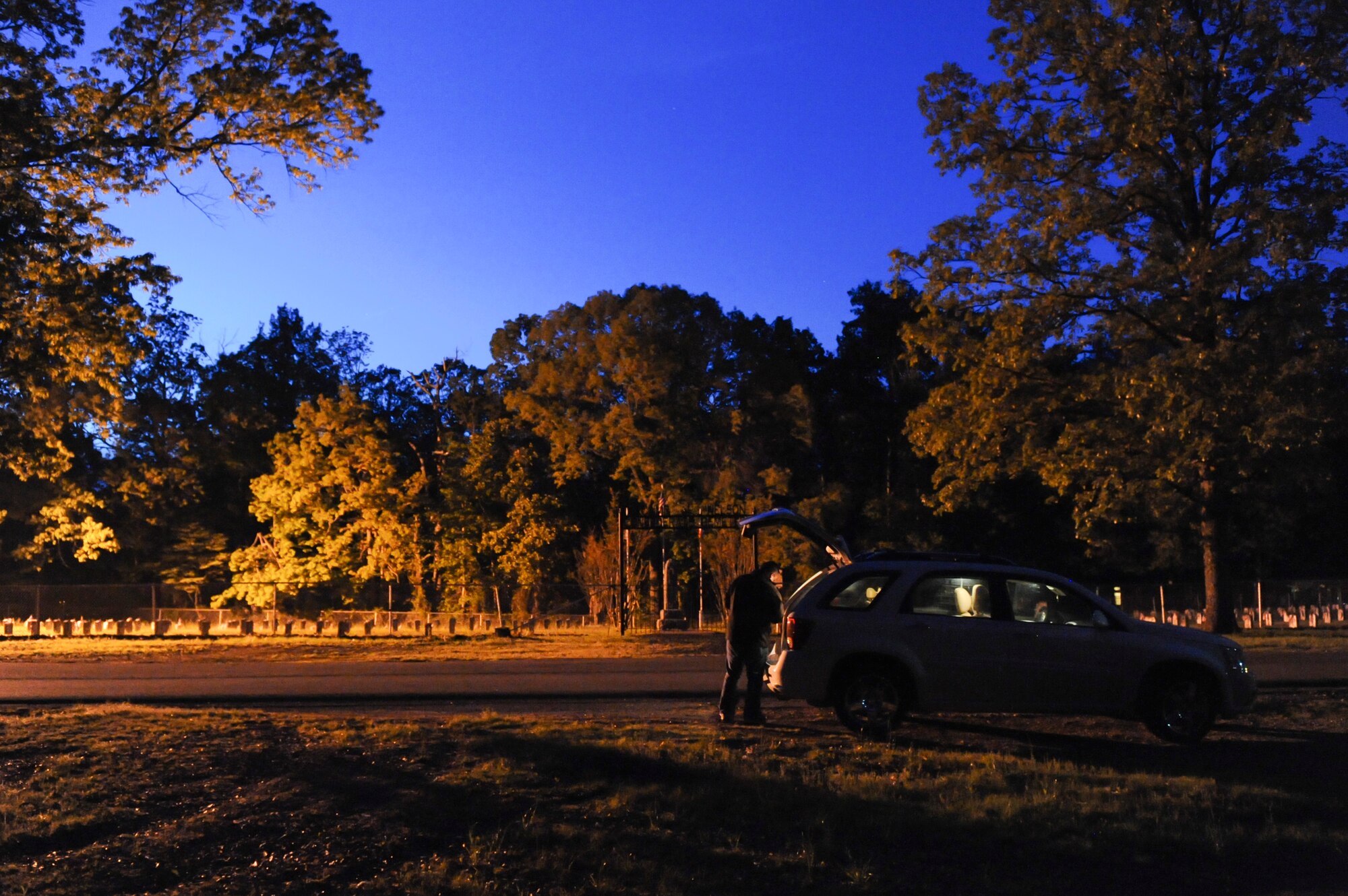 Staff Sgt. Justin Rangel, a 345th Recruiting Squadron recruiter, arrives at Camp Nelson Confederate Cemetery to start a paranormal investigation April 25, 2013, in Cabot, Ark. Rangel is co-lead investigator for the Fort Worth Paranormal team based out of Dallas-Fort Worth, Texas. (U.S. Air Force photo by Senior Airman Rusty Frank)