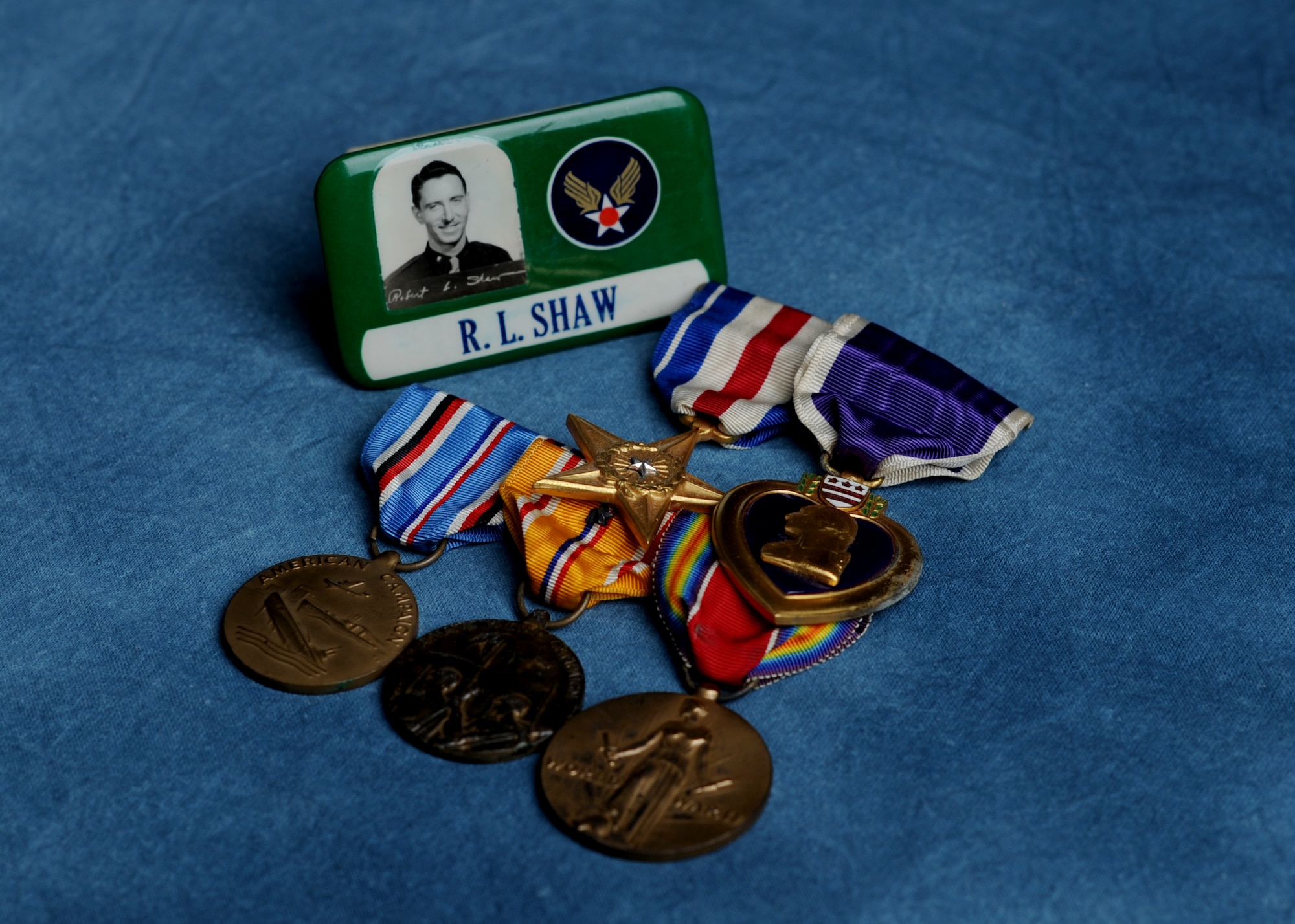 U.S. Army Air Forces 2nd Lt. Robert Shaw was awarded the Purple Heart and Silver Star among several other medals. Shaw, a weatherman, died in World War II after sacrificing his life to protect his fellow Soldiers. (Photo by Air Force Airman Areca T. Wilson/ Released)