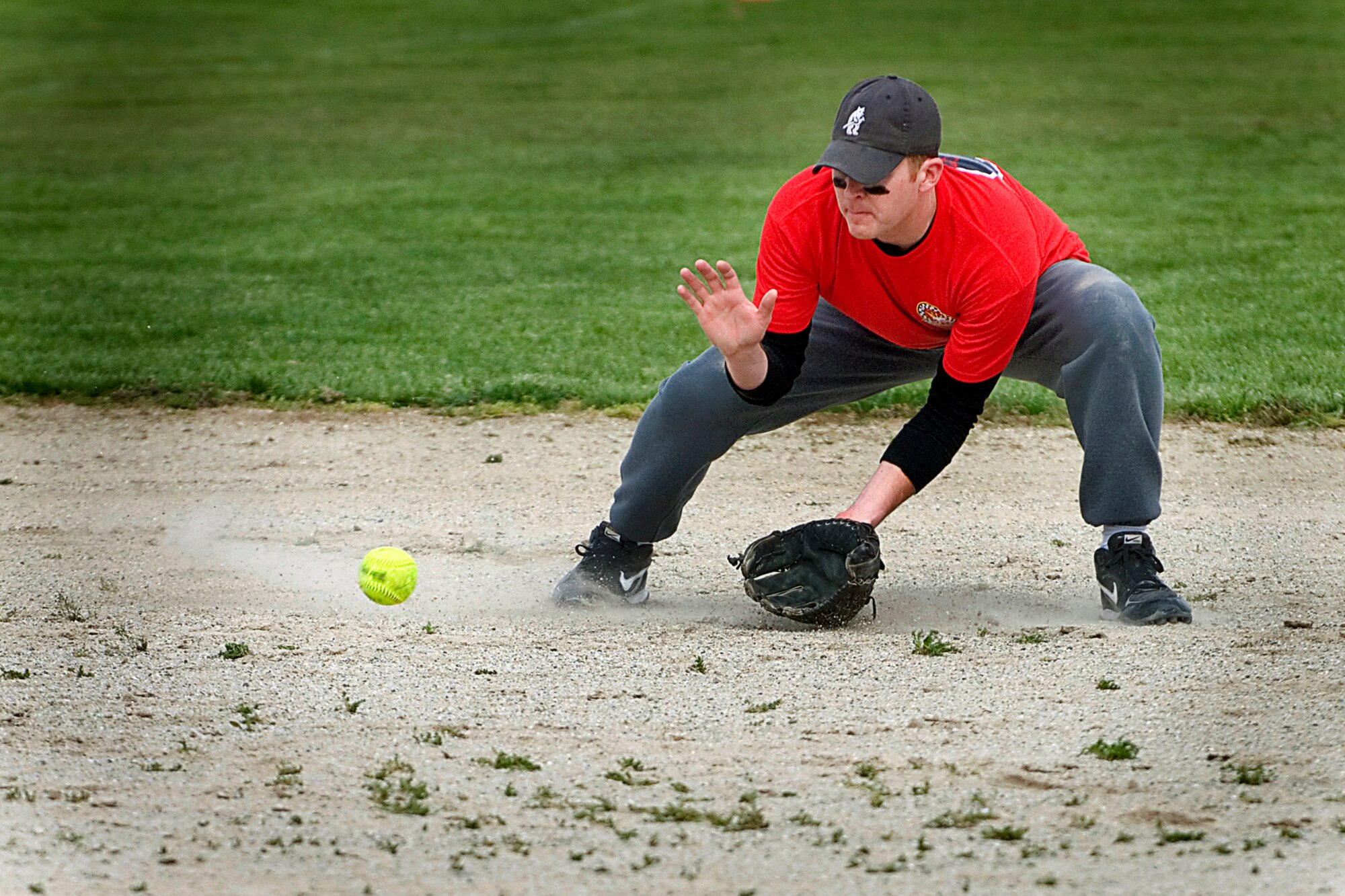 GRISSOM AIR RESERVE BASE, Ind. -- Joel Nickelson, 74th Air Refueling Squadron Fightin' Red Tags shortstop, positions himself to field a ground ball during the 7th Annual Jovanovich Cup on April 27. The Red Tags shot down the 72nd Air Refueling Squadron Dark Siders 9-5. (U.S. Air Force photo/Tech. Sgt. Doug Hays)