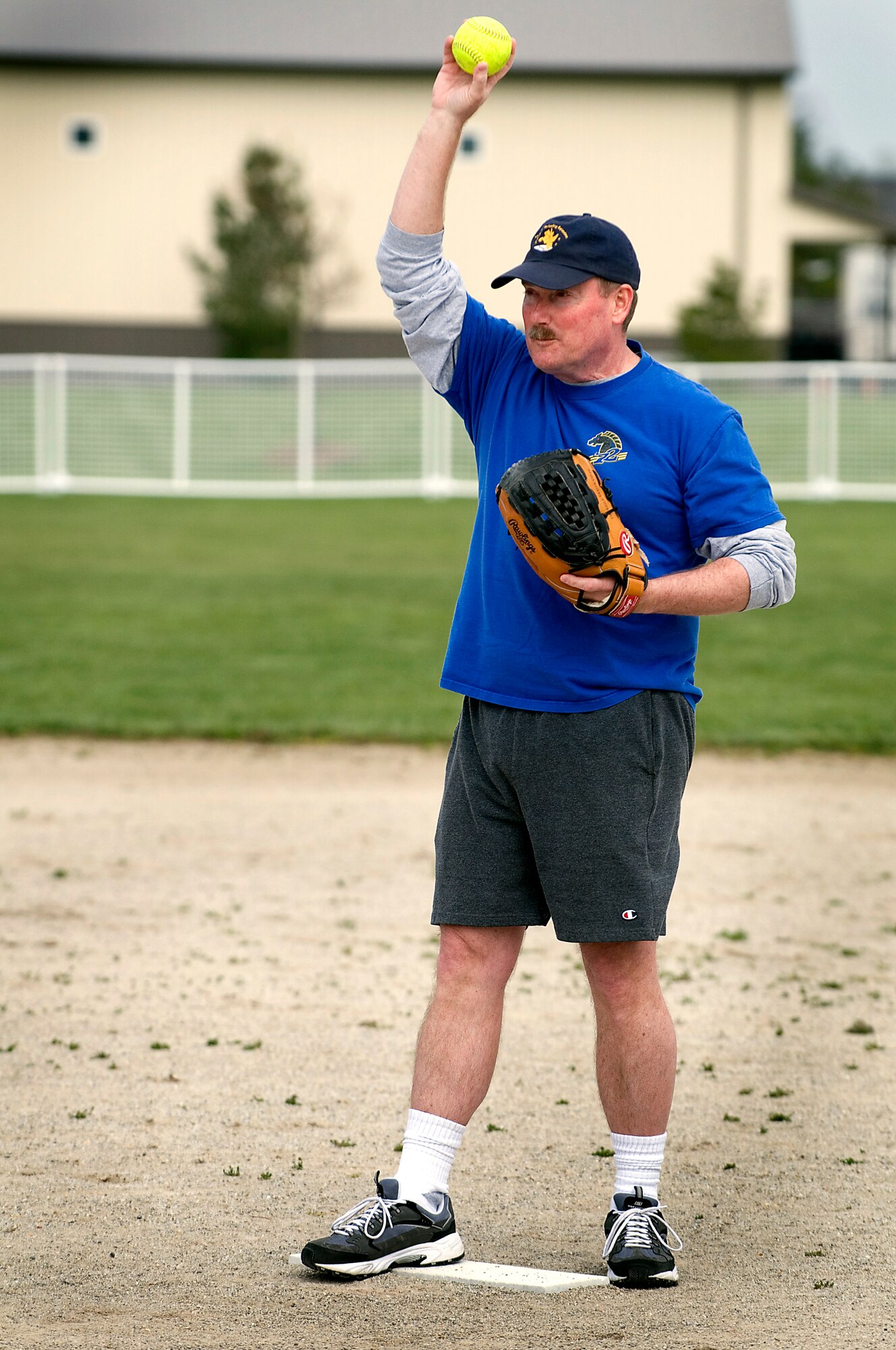GRISSOM AIR RESERVE BASE, Ind. -- Doug Gullion, 72nd Air Refueling Squadron Dark Side pitcher, holds the ball up as he prepares to make a pitch. Gullion and his Dark Side teammates fell to the 74th Air Refueling Squadron Fightin' Red Tags 9-5 April 27 in the 7th Annual Jovanovich Cup. (U.S. Air Force photo/Tech. Sgt. Doug Hays)