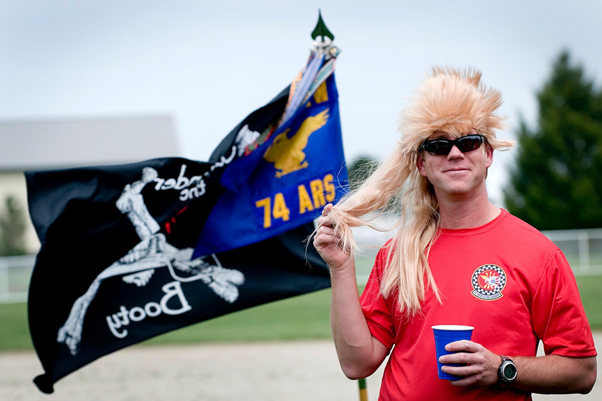 GRISSOM AIR RESERVE BASE, Ind. -- Tom 'Twisted Sister' Riedel, 74th Air Refueling Squadron Fightin' Red Tags member, gets into the spirit of fun for the Jovanovich Cup held April 27. The Fighting Red Tags of the 74th Air Refueling Squadron topped 72nd Air Refueling Squadron Dark Siders 9-5. (U.S. Air Force photo/Tech. Sgt. Doug Hays)