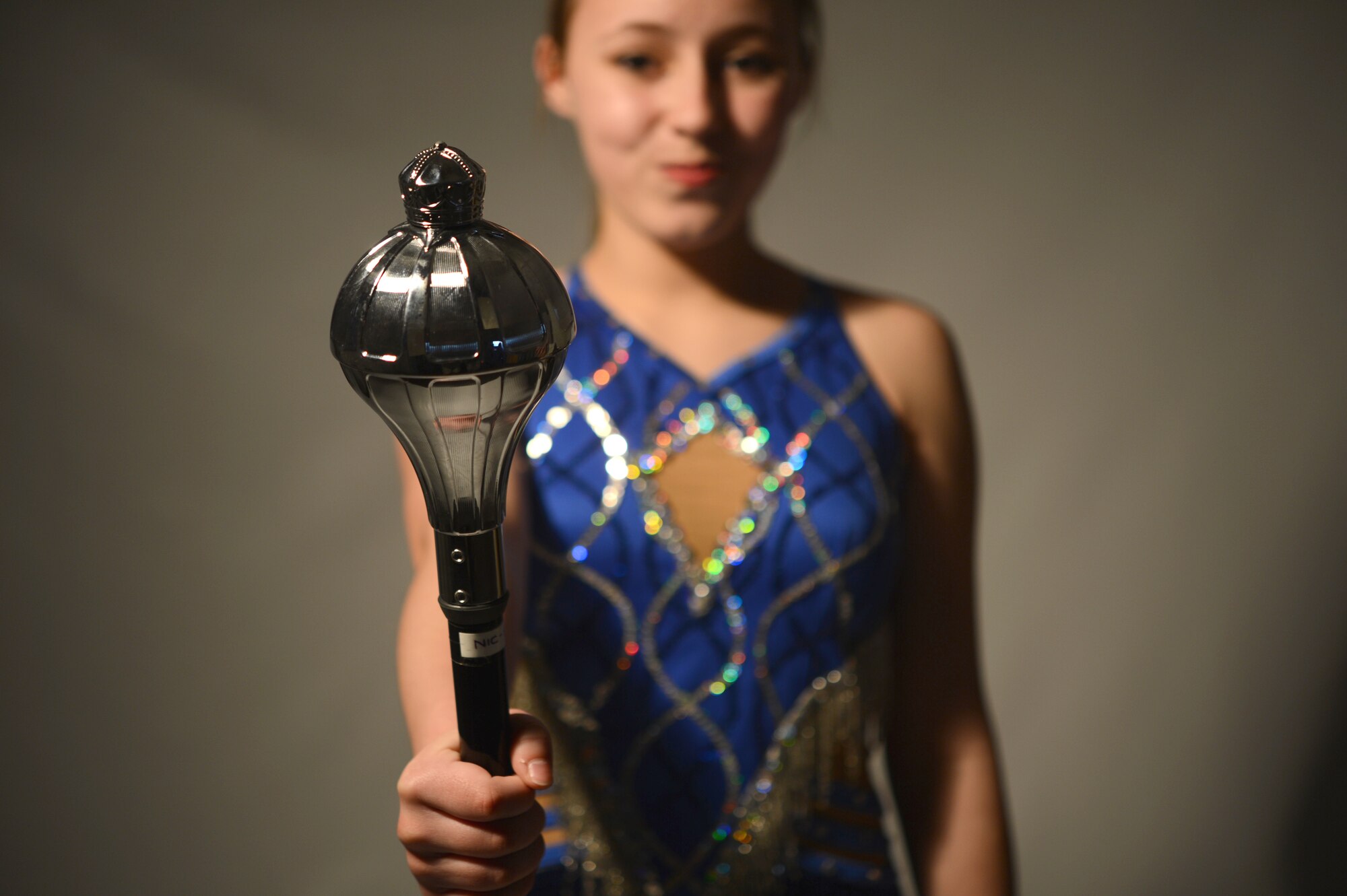 ROYAL AIR FORCE LAKENHEATH, England – Nicolette Gaboriault-Whitcomb, 13, daughter of Lt. Col. Steve Gaboriault-Whitcomb, 48th Aerospace Medicine Squadron bioenvironmental engineering flight commander, poses with a majorette’s mace May 14, 2013. Nicolette recently won first place at three different events at the United Kingdom Federation of Majorettes national competition. (U.S. Air Force photo by Airman 1st Class Dana J. Butler)