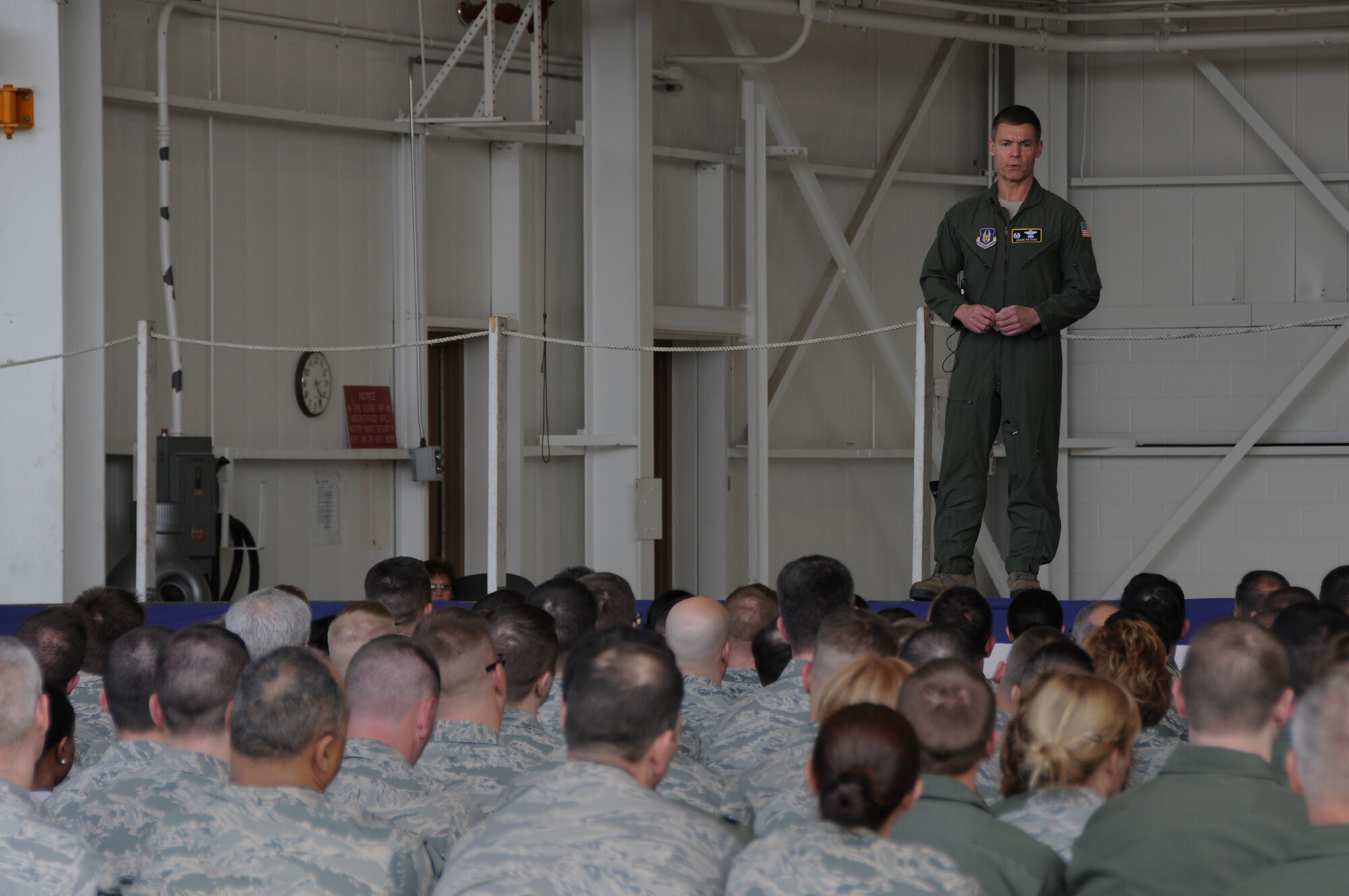 Col. Craig C. Peters, 911th Airlift Wing commander, briefs the entire wing on the newly instituted Annual Training Plan’ during a Commander’s Call and Mass Training Session held at the Pittsburgh International Airport Air Reserve Station, May 4, 2013. The goal of the Annual Training Plan is to provide predictability for the entire year, thereby making training commitments easier to complete on time. This plan will not only keep members current, but will also ease the additional training requirements as the unit prepares for its upcoming Operational Readiness Inspection.  (U.S. Air Force photo by Senior Airman Joshua J. Seybert/Released)