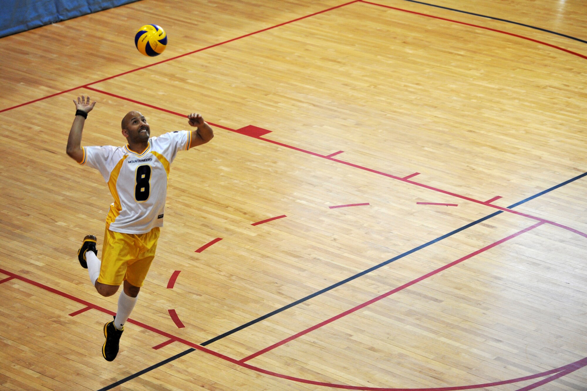 Tech. Sgt. Jarod Jones, 51st Maintenance Squadron aircraft metals technology NCO in charge, serves during the intramural volleyball championship game at Osan Air Base, Republic of Korea, May 15, 2013.  There were 16 teams in the league competing for the coveted intramural volleyball championship trophy. (U.S. Air Force photo/Staff Sgt. Emerson Nuñez)