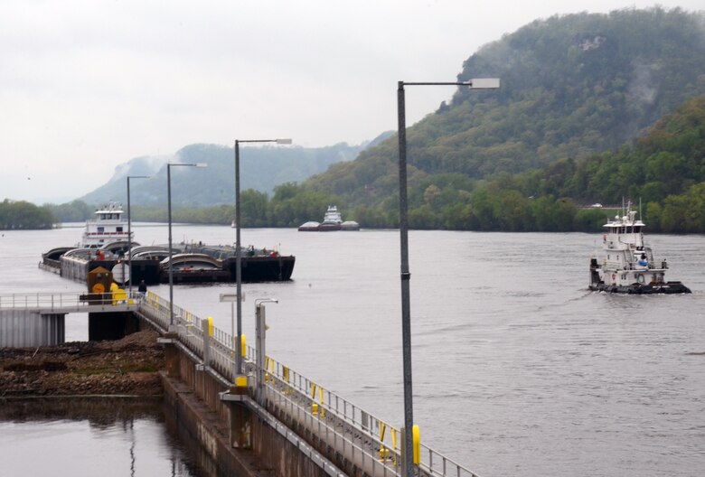 Ingram Barge Company's motor vessel R. Clayton McWhorter makes approach to Lock & Dam 5A near Winona, Minn., on May 17, 2013. This tow was the first tow to lock through following a barge struck and seriously damaged one of the upstream gates on May 16.