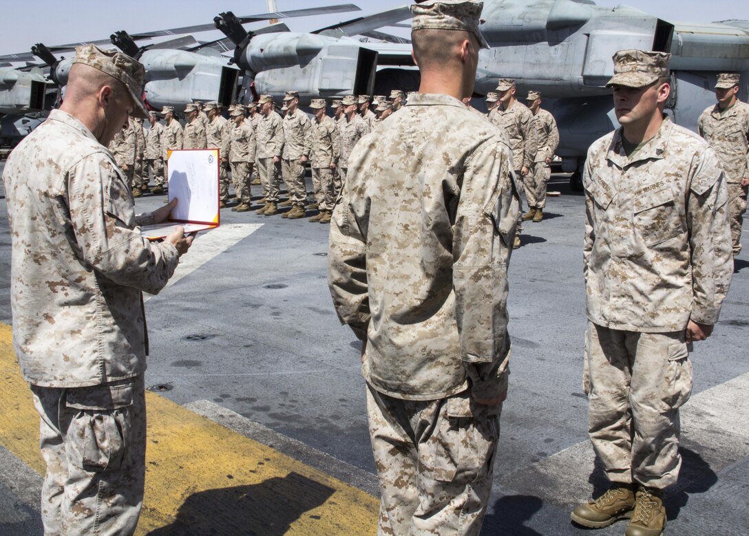 U.S. Marine Sgt. Timothy J. Comeau, Battalion Landing Team 3/2, 26th Marine Expeditionary Unit (MEU) is awarded the Purple Heart for wounds received in action Feb. 23, 2011, in Afghanistan on the flight deck of the USS Kearsarge (LHD 3), Eilat, Israel, May 14, 2013. The 26th MEU is deployed to the 5th Fleet area of operations aboard the Kearsarge Amphibious Ready Group. The 26th MEU operates continuously across the globe, providing the president and unified combatant commanders with a forward-deployed, sea-based quick reaction force. The MEU is a Marine Air-Ground Task Force capable of conducting amphibious operations, crisis response and limited contingency operations. (U.S. Marine Corps photograph by Gunnery Sgt. Michael Kropiewnicki/26th MEU Combat Camera/Released)