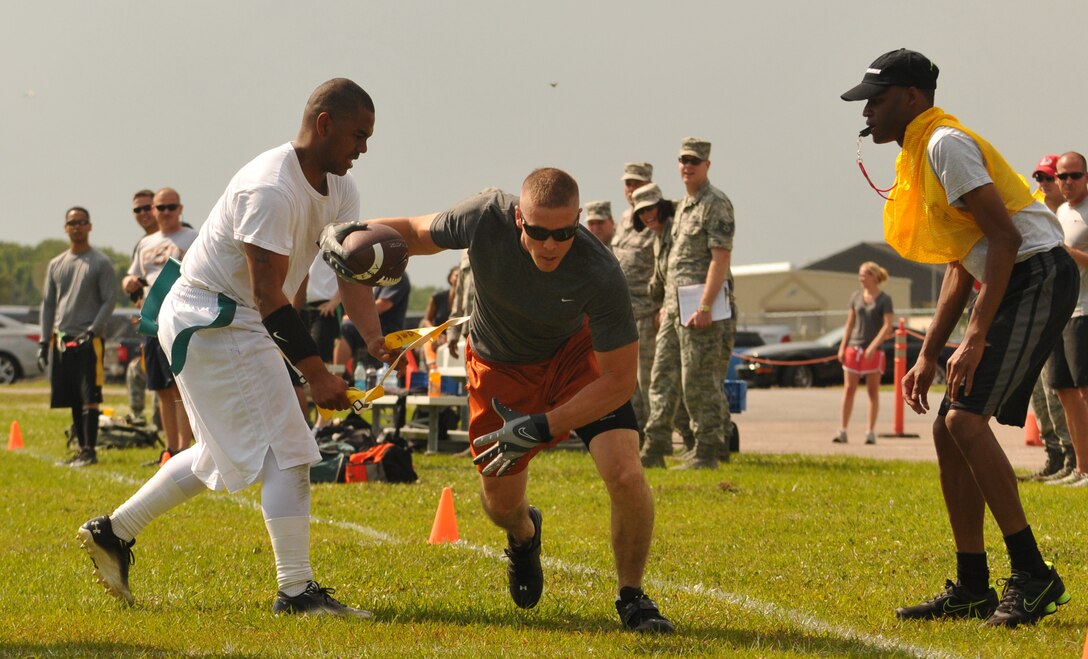 The inaugural flag football game was held on May 18, 2013 at the 125th Fighter Wing, Jacksonville Fla.  Flag football has been introduced as part of the MWR program at the wing. (Air National Guard photo by Technical Sgt. William Buchanan/released)