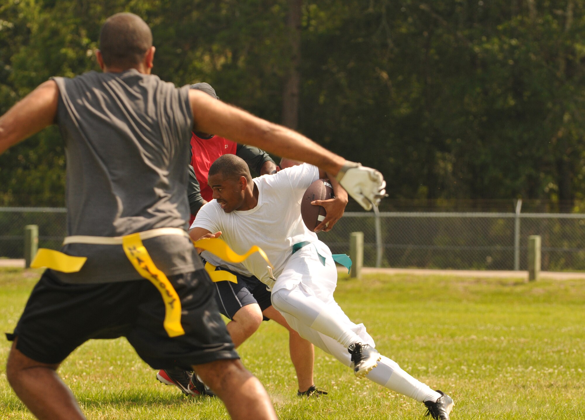 The inaugural flag football game was held on May 18, 2013 at the 125th Fighter Wing, Jacksonville Fla.  Flag football has been introduced as part of the MWR program at the wing. (Air National Guard photo by Technical Sgt. William Buchanan/released)