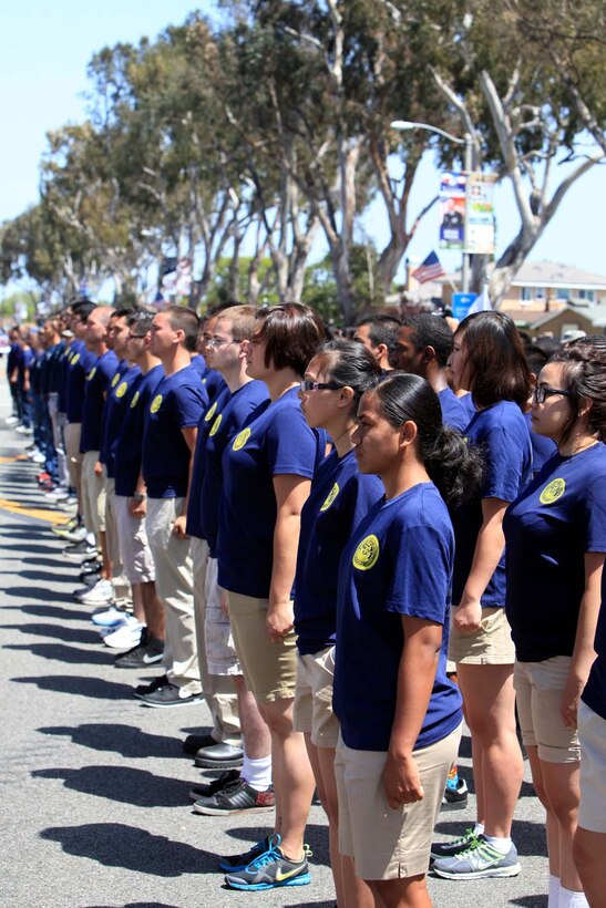 More than 500 future service members recited the oath of enlistment in a mass swearing-in ceremony at the 54th Annual Armed Forces Day Celebration and Parade at Torrance, Calif., May 18. The citizens of Torrance could enjoy a military exhibit displaying various vehicles and a free concert.