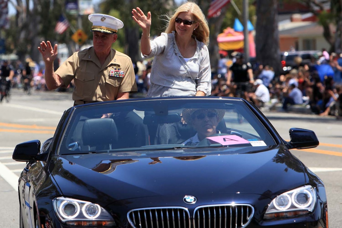 Retired Maj. Gen. Melvin G. Spiese, former deputy commanding general of I Marine Expeditionary Force, accompanied by his wife Filomena, acts as the grand marshal for the 54th Annual Armed Forces Day Celebration and Parade, at Torrance, Calif., May 18. Montford Point Marines were honored during the parade for their sacrifices in helping to pave the way for minorities in the armed forces.