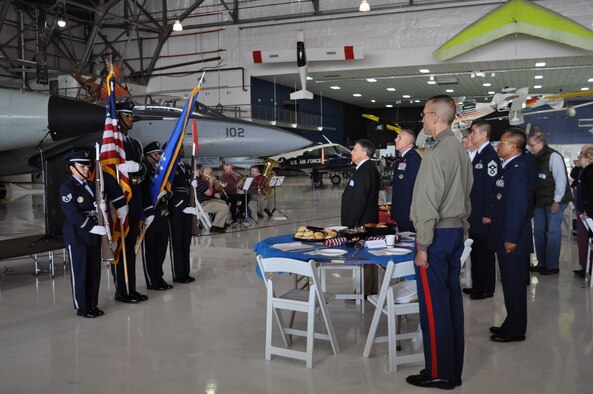 Members of the Air Reserve Personnel Center honor guard, Staff Sgt. Cindy Rodriguez, Senior Airman Sean Cooper, Staff Sgt. Ashley Kidder, and Staff Sgt. Letitia Edwards post the colors while the Smoky Hill Brass plays the national anthem during opening ceremonies. The Rotary Club of Denver Southeast sponsored the 7th Annual Veterans' Appreciation Breakfast at the Wings Over the Rockies Air and Space Museum in Denver, May 11. (Courtesy photo of Cyndee Johnson) 

