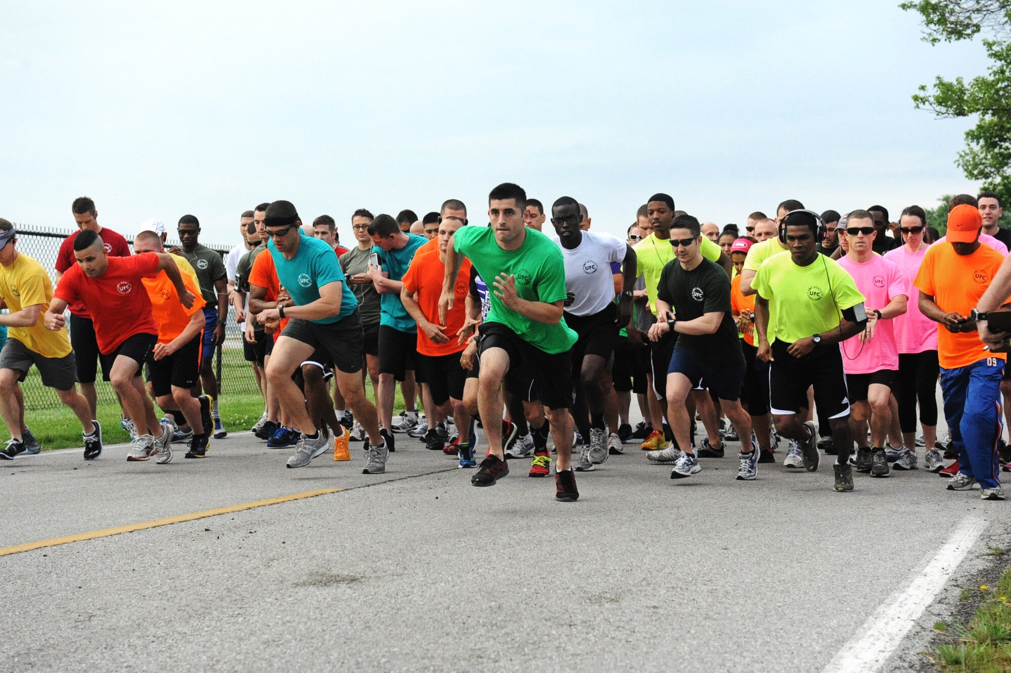 Participants of the 2013 Unit Fitness Challenge began the 5K at the Airman Leadership Field May 17. Nineteen teams competed against each other for the title of the UFC Champion. (U.S Air Force photo/Senior Airman Jake Eckhardt)