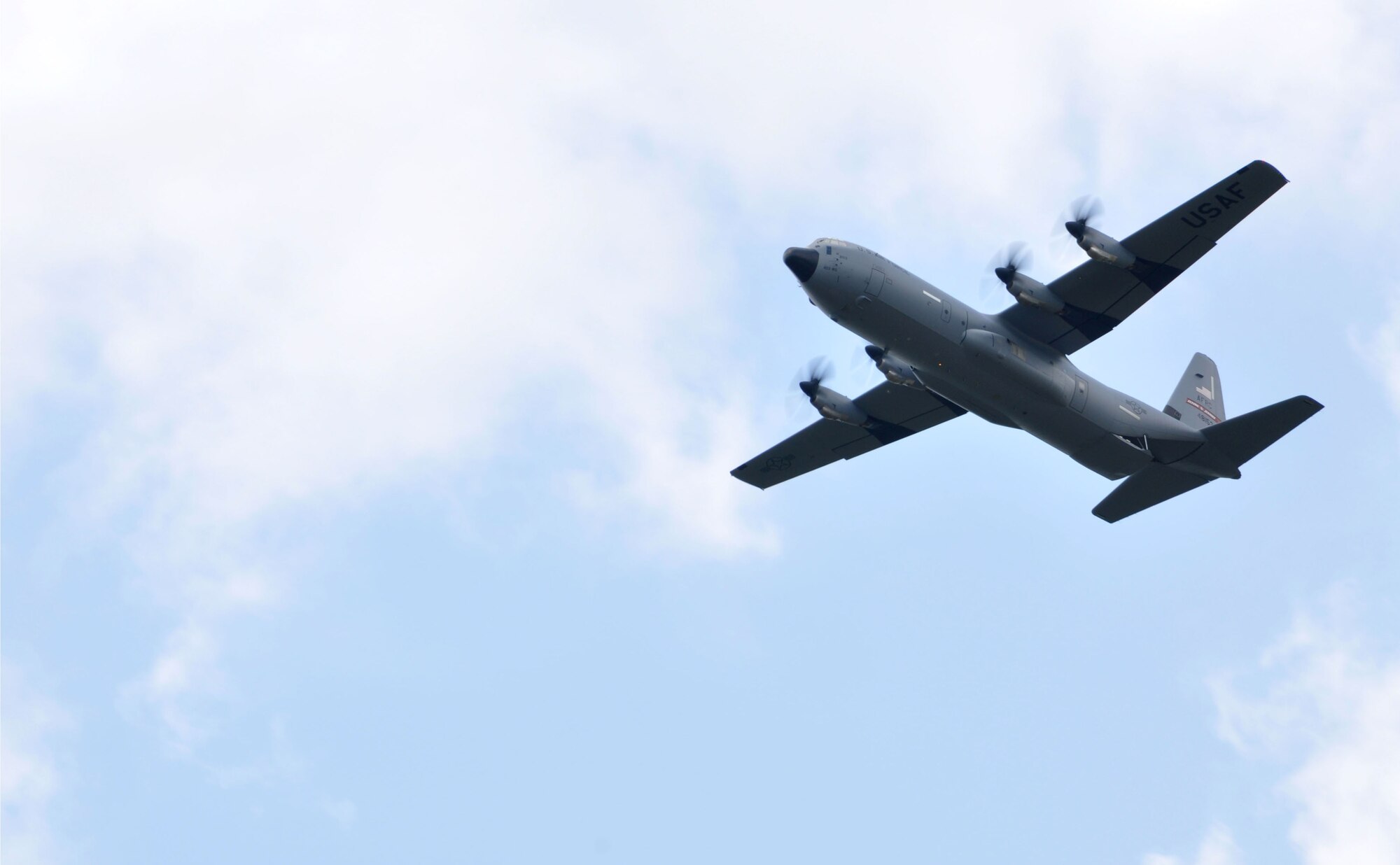 A Keesler C-130J from the 815th Airlift Squadron flies during Joint Safety Day May 18, 2013 at Stennis International Airport in Kiln, Miss. A product of the Mid-Air Collision Avoidance program, the event was open to all area pilots to increase dialogue between the military and civilian aviation communities. (U.S. Air Force photo by Airman 1st Class Stephan Coleman)