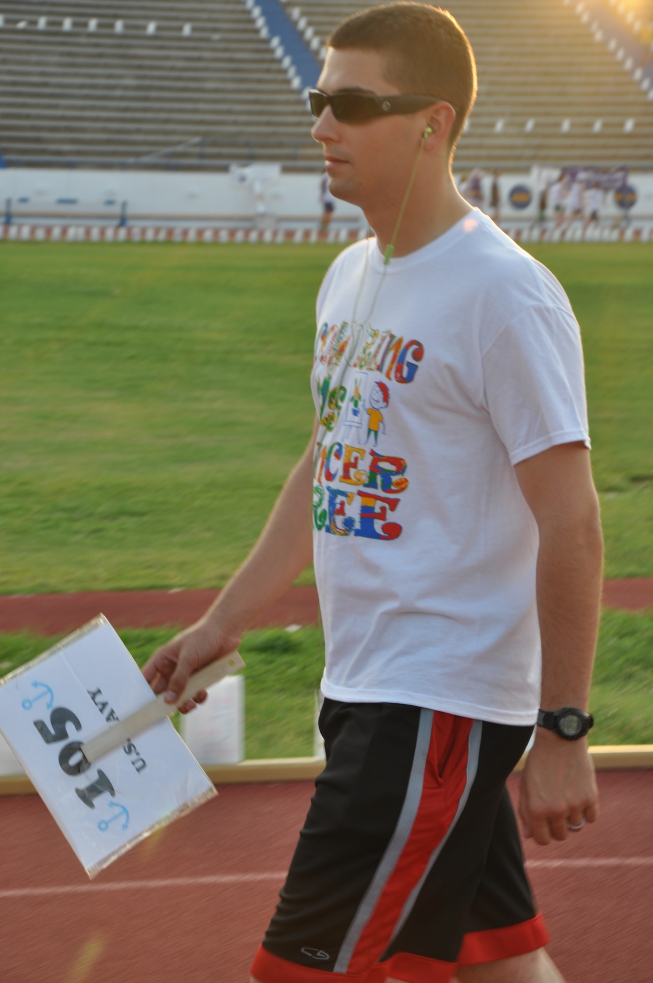 SAN ANGELO, Texas – Seaman Apprentice Tyler Walker, Navy Center for Information Dominance Detachment student, walks a lap during the Relay for Life event at the Angelo State University track and field May 17. 1,305 volunteers participated in the event and walked a total of 6,418 laps. (U.S. Air Force photo/ Airman 1st Class Joshua Edwards)