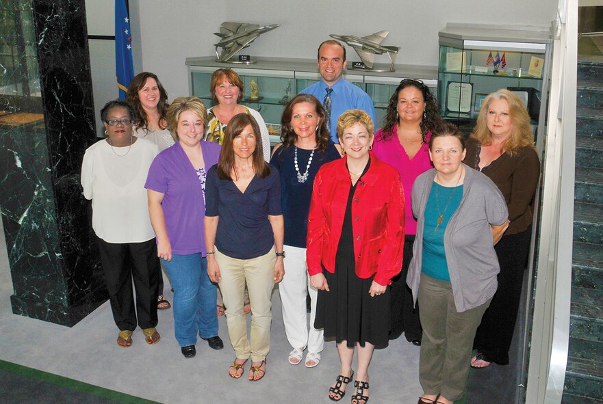 Information Protection (IP) office team members recently received the AFMC 2012 Information Protection Team of the Year Award. Team members shown in this photo on the front row, left to right are: Loraine McElroy, ATA; Holly Petty, AEDC Test Support Division (TSD)-IP; Keena Cornelius, ATA; Jeannie Bowden, ATA ; Angelia Garrard, ATA; Vivian Seals, ATA; on the second row, l-r: Tamalena Breiding, ATA; Kathy Saine, ATA; David Madison, TSD-IP; Nichol Northcutt, ATA; and Elise Sherrell, ATA. Team members not shown are Jack Glasser, TSD-IP; Lindsay Haig, Test Operations Division (TST) – Tunnel 9; and Charles Ingalls, TST – NFAC. (Photo by Rick Goodfriend)