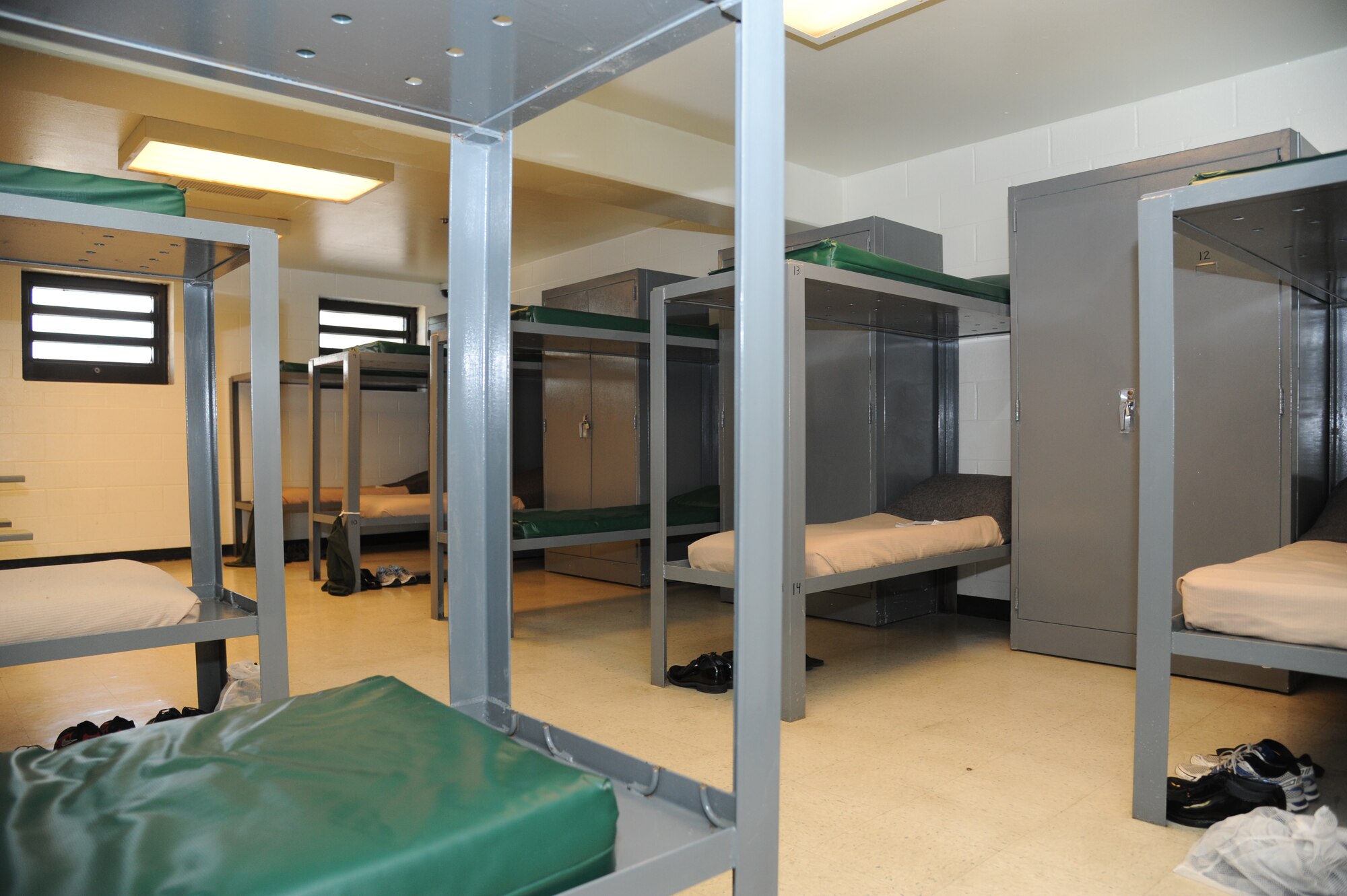 The 81st Security Forces Squadron confinement facility open bay area can hold up to 14 inmates at Keesler Air Force Base, Miss.  It can house military inmates post and pre-trial on a rehabilitative basis and also accommodates 6 isolation cells, a small book collection and a recreation area.  (U.S. Air Force photo by Kemberly Groue)