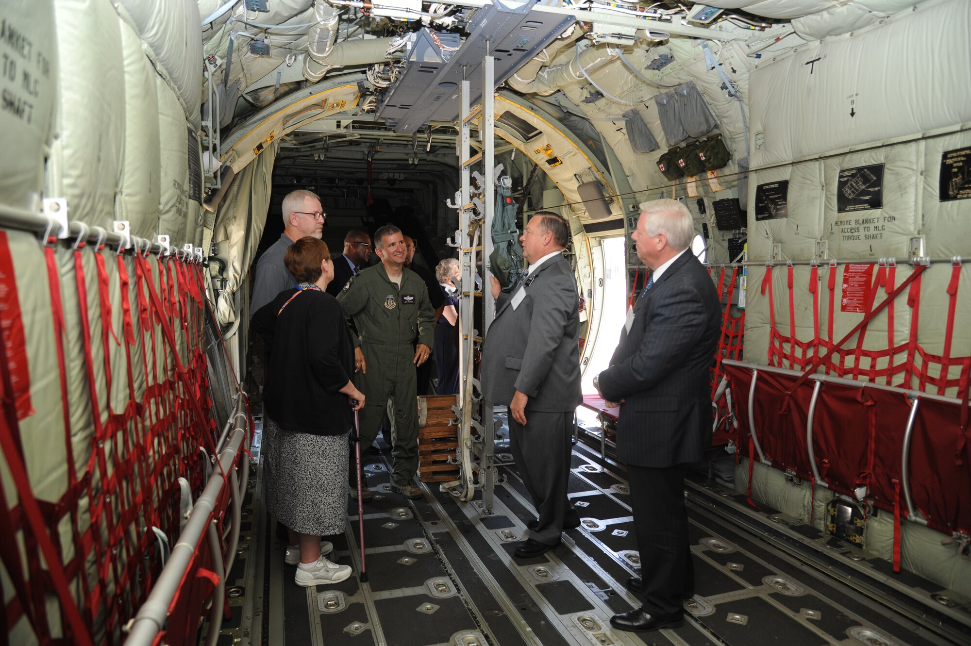 Lt. Col. Jeff Ragusa, 53rd Weather Reconnaissance Squadron, briefs local clergymen and clergywomen about the Hurricane Hunters’ flying mission aboard a C-130J aircraft May 20, 2013, at Keesler Air Force Base, Miss.  Throughout the one-day visit in celebration of clergy day, local clergymen and clergywomen also received briefings about the 81st Medical Group and the 81st Training Wing.  (U.S. Air Force photo by Kemberly Groue)
