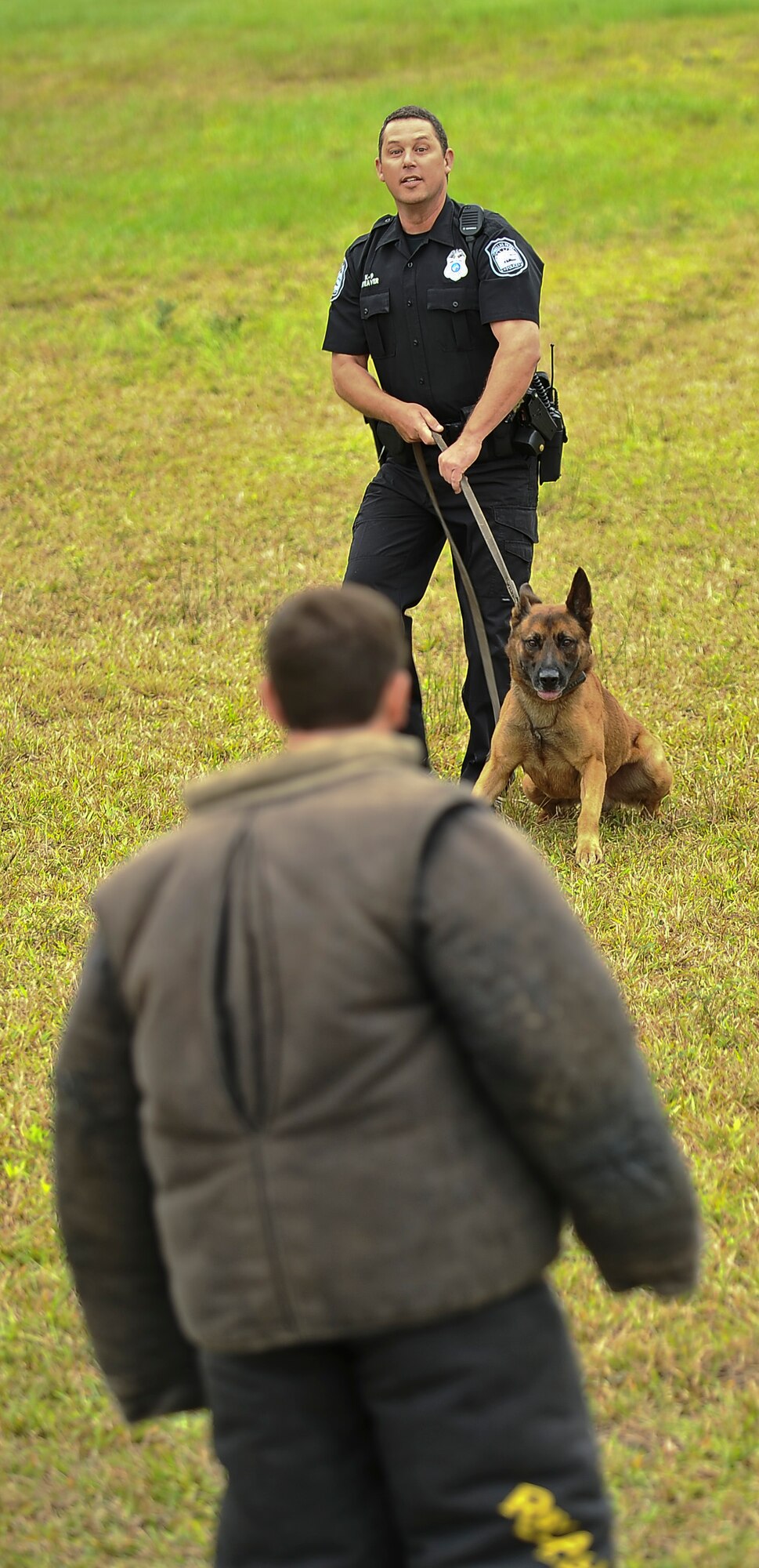 Doug Weaver, Pinellas Park Police Department K-9 officer and his dog Tank, take part in the 6th Security Forces Squadron’s first annual “Top Dog” handler competition on May 13, 2013 at MacDill Air Force Base, Fla. Thirteen organizations from around the state of Florida joined in on the competition, which was held in honor of National Police Officer Week. (U.S. Air Force photo by Staff Sgt. Brandon Shapiro/ Released)