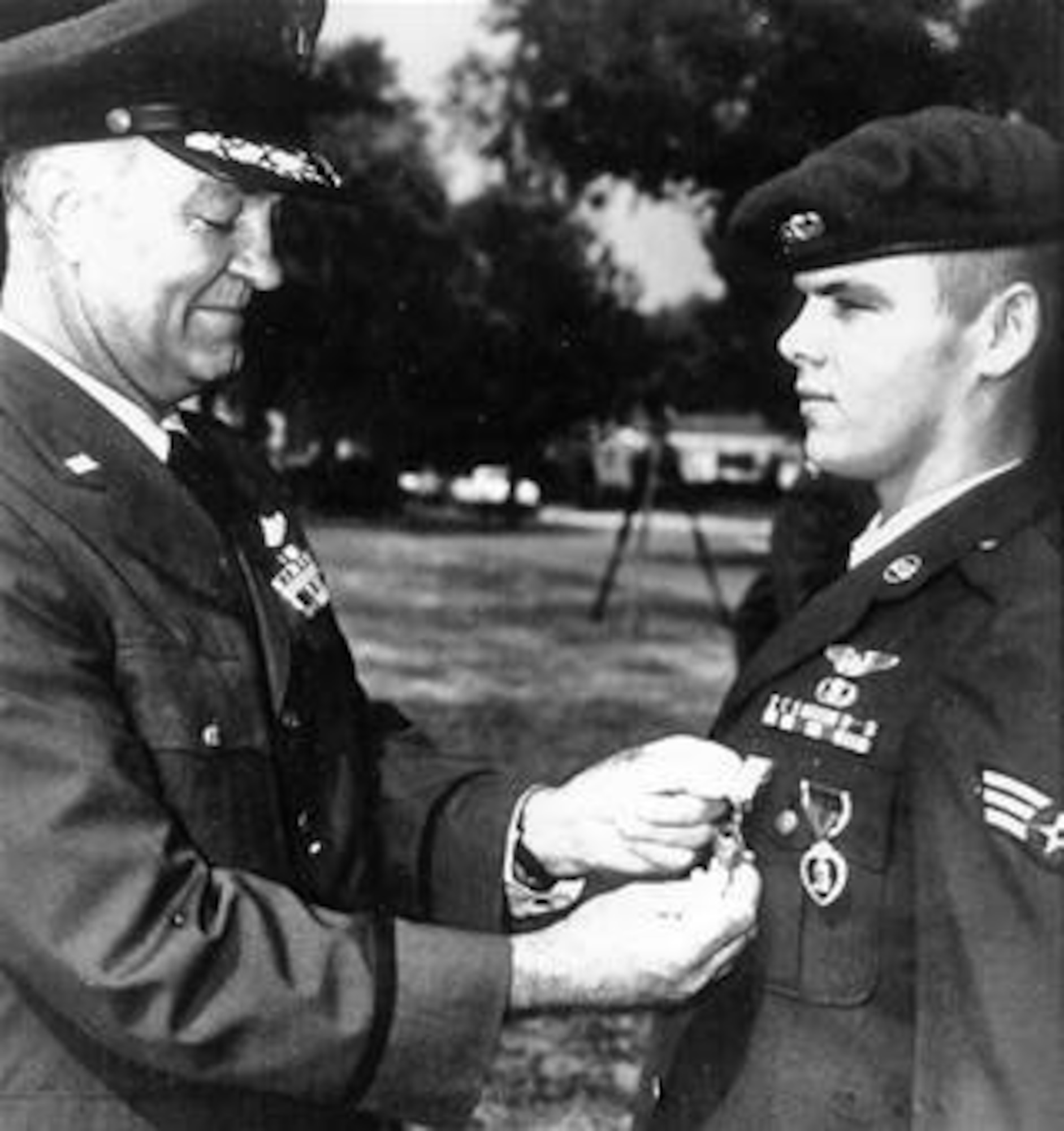 Airman 2nd Class (E-4) Duane Hackney receives the Air Force Cross from Gen. Howell M. Estes, Jr. in 1967. Hackney received his Air Force Cross while on a mission Feb. 6, 1967. He was the first living enlisted airman to receive the second highest award for heroism given by the U.S. Air Force. (Courtesy photo)