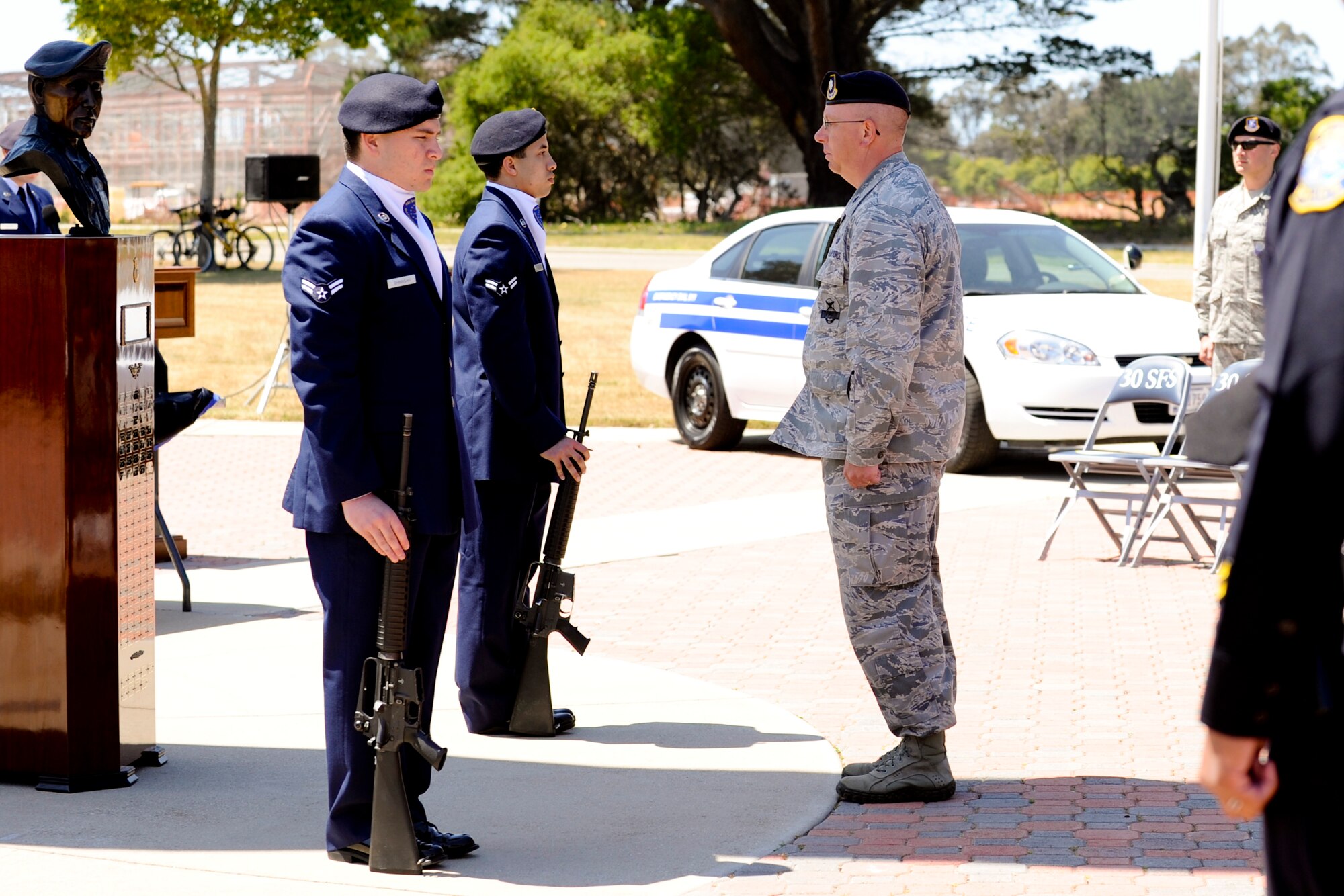 VANDENBERG AIR FORCE BASE, Calif. – Lt. Col. Gerald Mulhollen, 30th Security Forces Squadron commander, releases the guards from the 24 hour vigil during a closing ceremony at Missile V here Friday, May 17, 2013. National Police Week commemorated law enforcement personnel who have fallen in the line of duty. (U.S. Air Force photo/Airman Yvonne Morales)