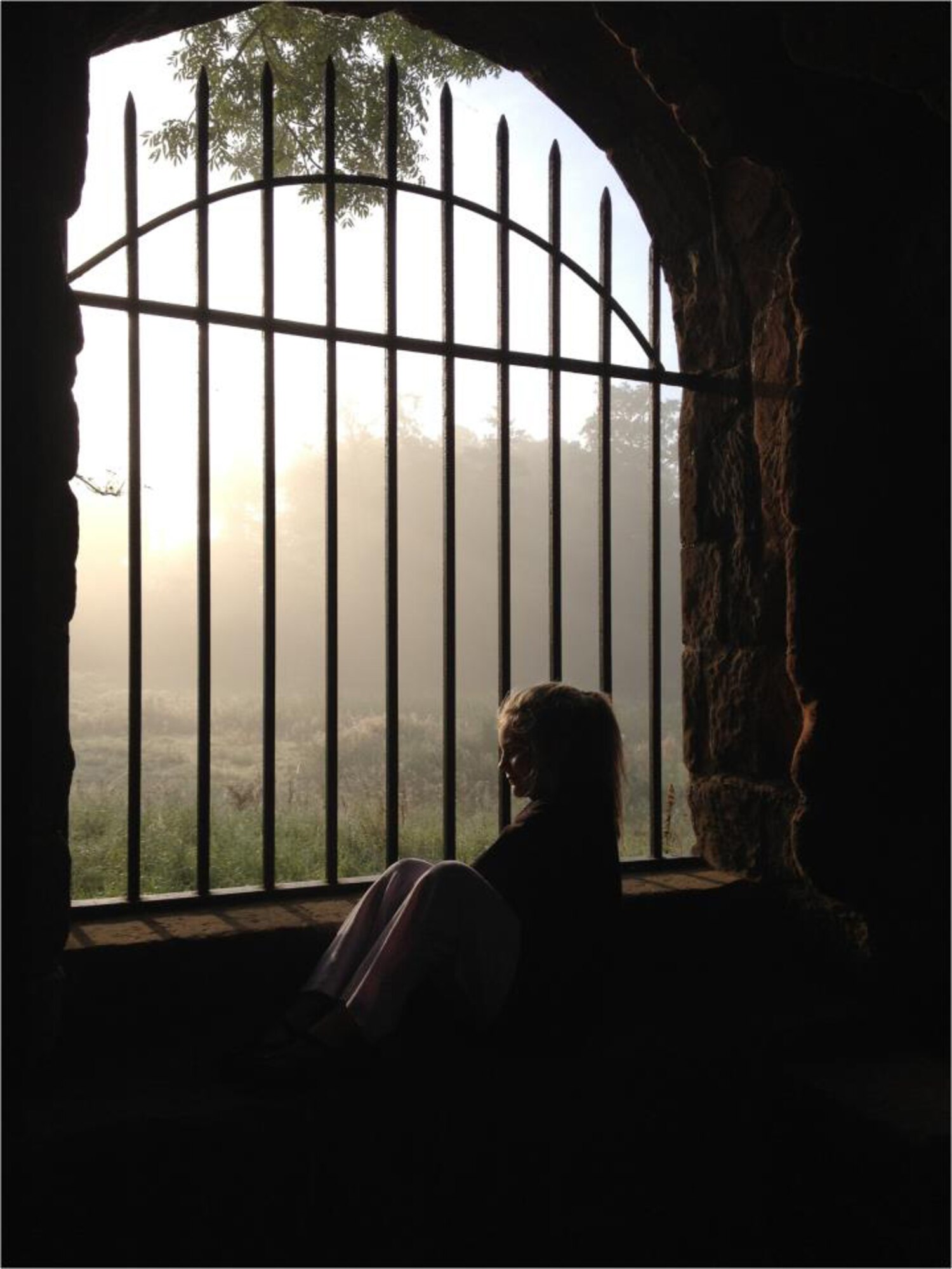 Before the gates open to the public, a child takes a moment to look out into the lush landscape surrounding Kenilworth Castle in Warwickshire, England. The castle grounds also boast having a Mere – a great lake that was transformed into England’s largest manmade lake in approximately 1166 A.D. by King John. (Courtesy photo by Stacia Zachary/Released)