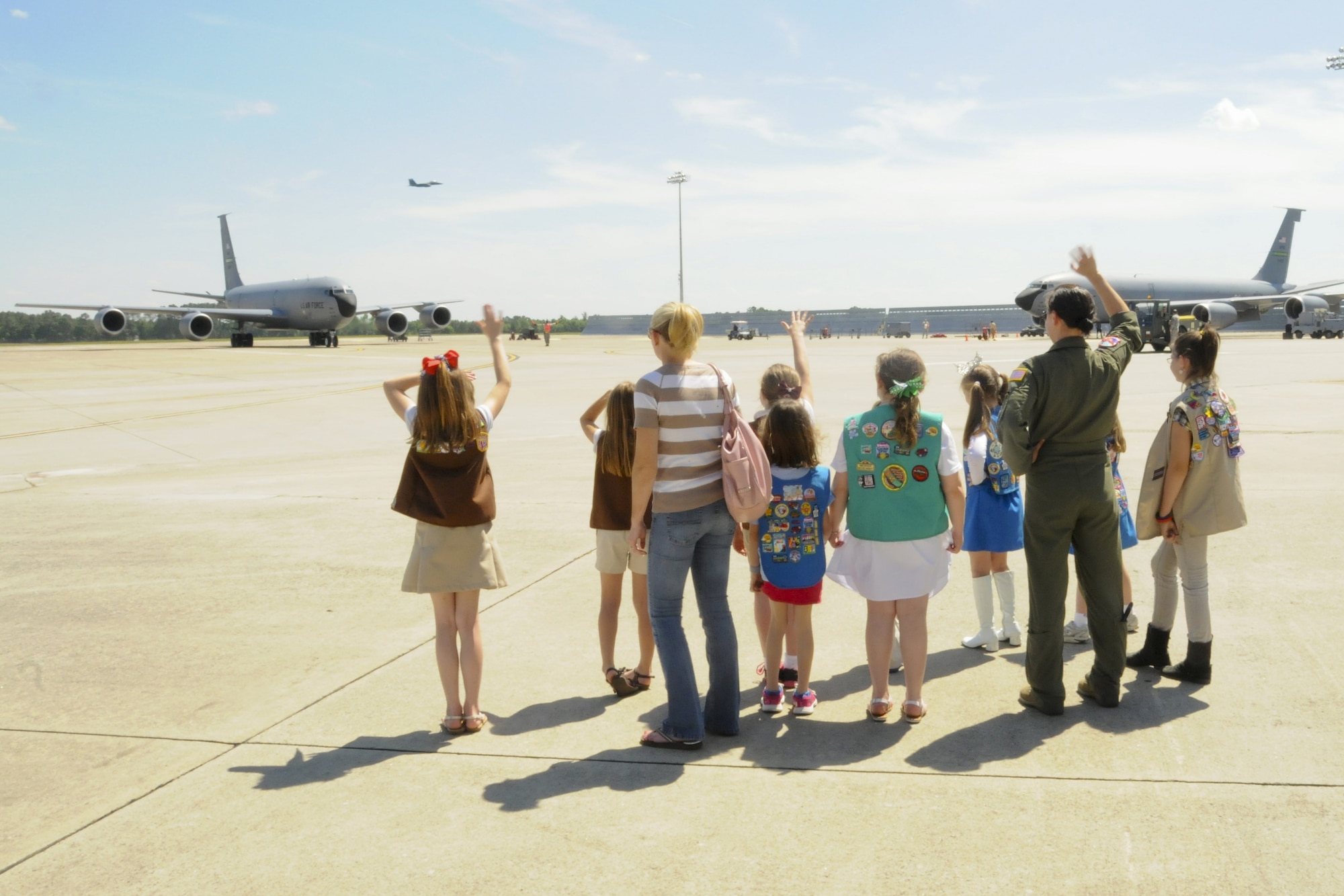 Nearly 30 Girl Scouts helped deliver 10,000 boxes of cookies to Seymour Johnson on May 9, 2013. The 916th Air Refueling Wing offered a static tour of a KC-135R and during that time the young ladies were able to watch a jet taxi onto the ramp. (USAF photo by TSgt. Scotty Sweatt, 916ARW/PA)