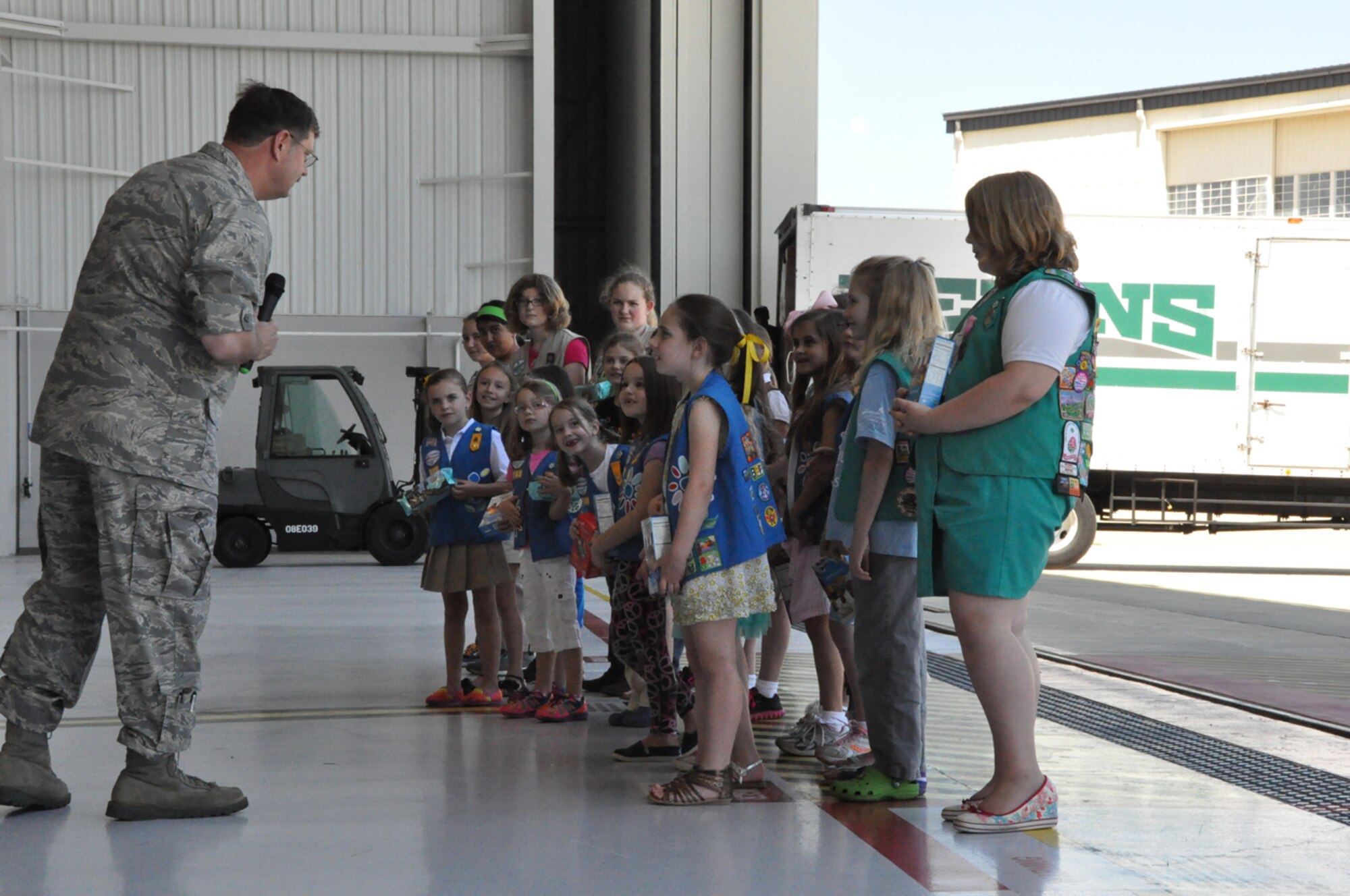Col. Greg Gilmour, 916th Air Refueling Wing commander, talks with some Girl Scouts who attended Operation Cookie Drop at Seymour Johnson on May 9, 2013. (USAF photo by MSgt. Wendy Lopedote, 916ARW/PA)