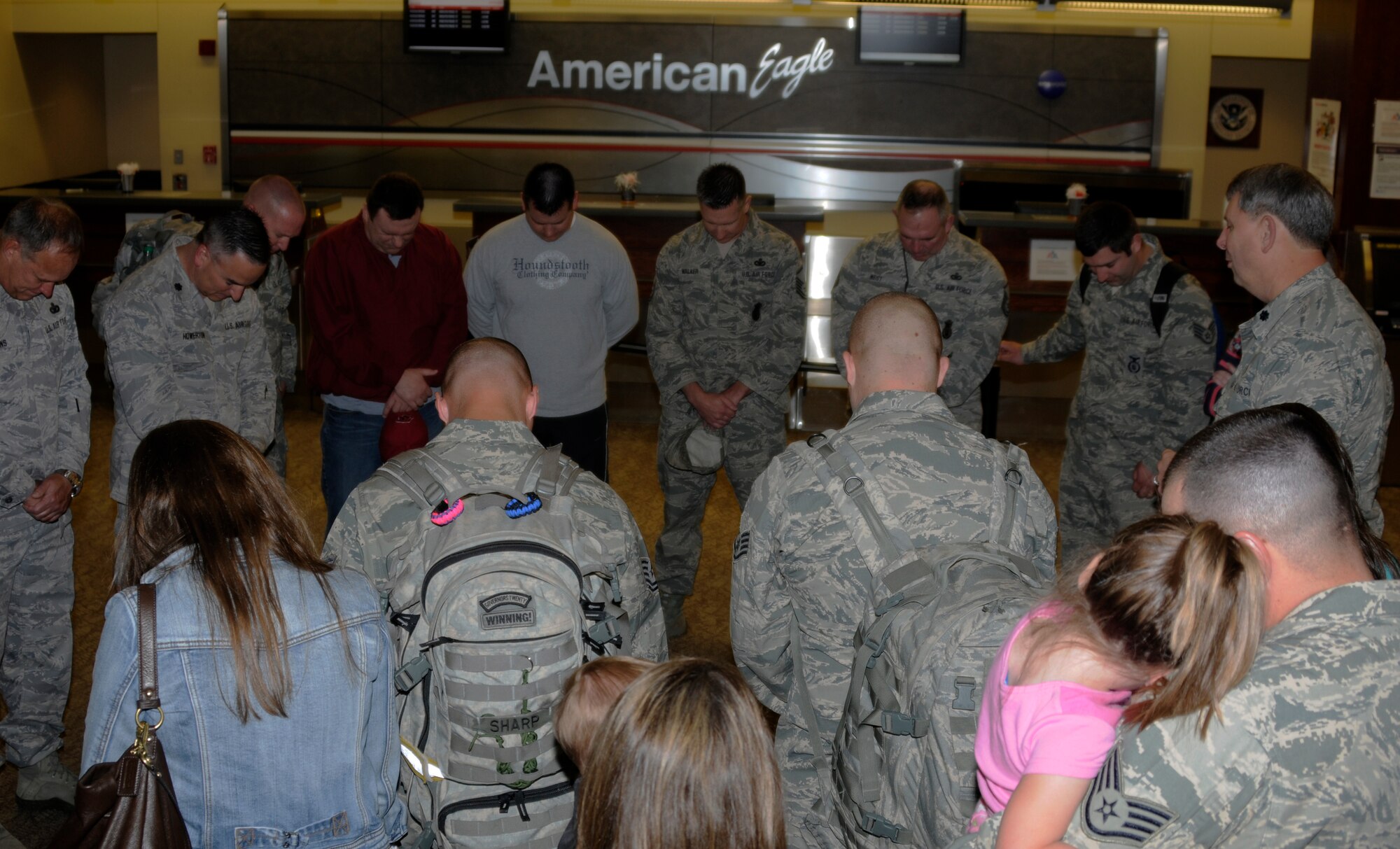 Friends and family members gather at the Fort Smith Regional Airport to say goodbye to members of the 188th Fighter Wing’s Security Forces Squadron, which embarked on a six-month deployment to Southwest Asia in support of Operation Enduring Freedom, May 13, 2013. While there, the 188th SFS will provide installation support and security for assigned aircraft. (U.S. Air National Guard photo by Senior Airman Hannah Landeros/188th Fighter Wing Public Affairs)