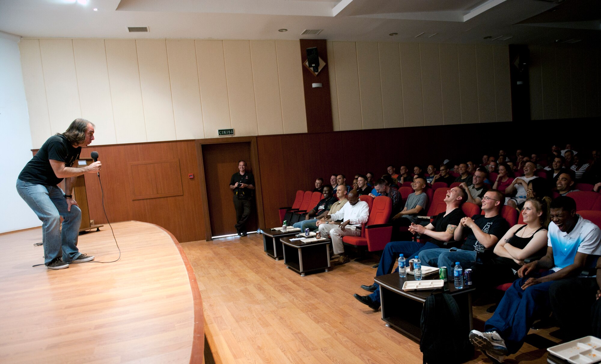 Jeff Capri, a comedian in Don Barnhart’s All-Star Comedy team, delivers jokes to 3rd Battalion, 2nd Air Defense Artillery soldiers May 19, 2013, at Gaziantep, Turkey. Capri is touring various installations courtesy of Armed Forces Entertainment. (U.S. Air Force photo by Senior Airman Daniel Phelps/Released)