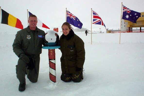 Master Sgt. Dusty Snyder, 109th Airlift Wing, New York Air National Guard, aerospace propulsion craftsman and Staff Sgt. Sophia Mantzouris, 386th Aircraft Maintenance Squadron, aerospace propulsion journeyman pose for a picture at the Amundsen-Scott South Pole Station, Antarctica during an Operation Deep Freeze mission Nov 20, 2003. Mantzouris, native of East Greenbush, N.Y., is deployed here from the 166th Airlift Wing, Delaware Air National Guard. (Courtesy photo)