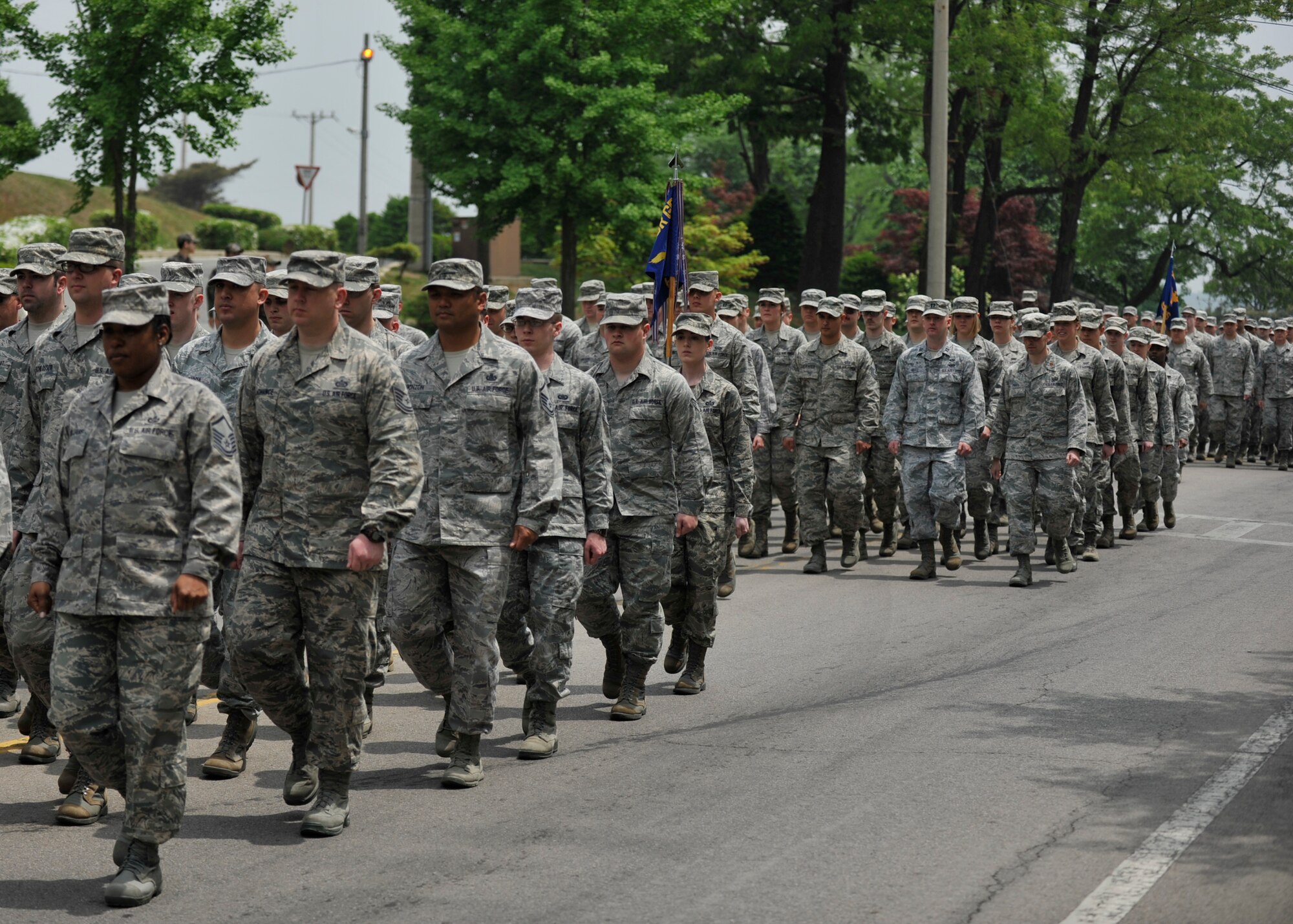Participants in the Veterans of Foreign Wars Armed Forces Day Parade march at Osan Air Base, Republic of Korea, May 18, 2013. More than 35 different units participated in the parade, which started at the Osan Main Gate on Songtan Boulevard and ended by the Turumi Lodge. (U.S. Air Force photo/Senior Airman Siuta B. Ika)