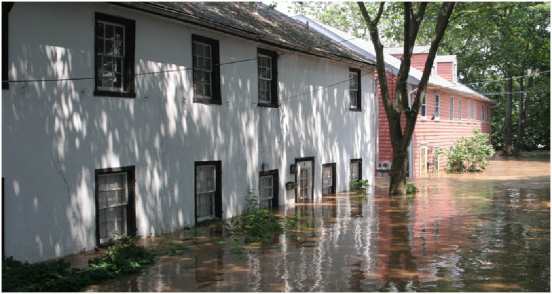 An effective flood warning and response system is necessary to prepare for flood events, and to reduce property damage and the loss of life. This photo shows first floor flooding of residential structures in New Hope, Penn. in 2006.