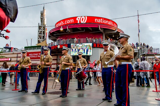 The Quantico Marine Corps Band's Party Band perform during the May 5, 2013, Marine Day baseball game. The Party Band performed three songs just inside park prior to the game.  