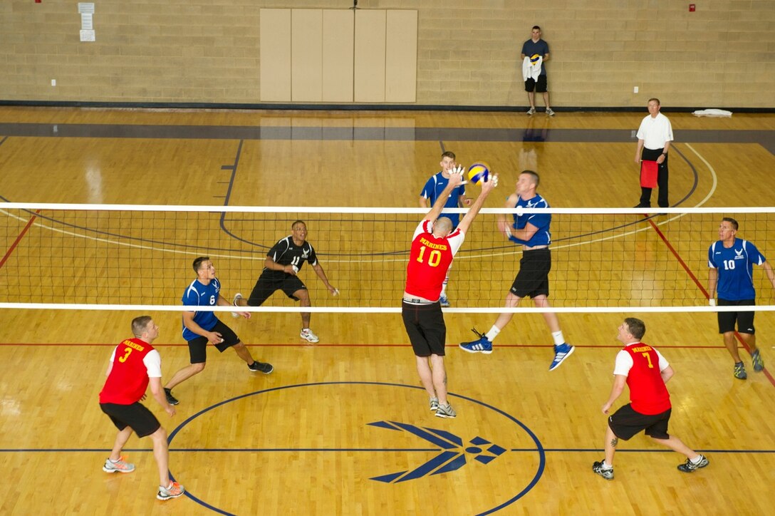 All Tourney selectee Sgt Clay Dooley (USMC #10 Camp Pendleton, CA) blocks a USAF spike