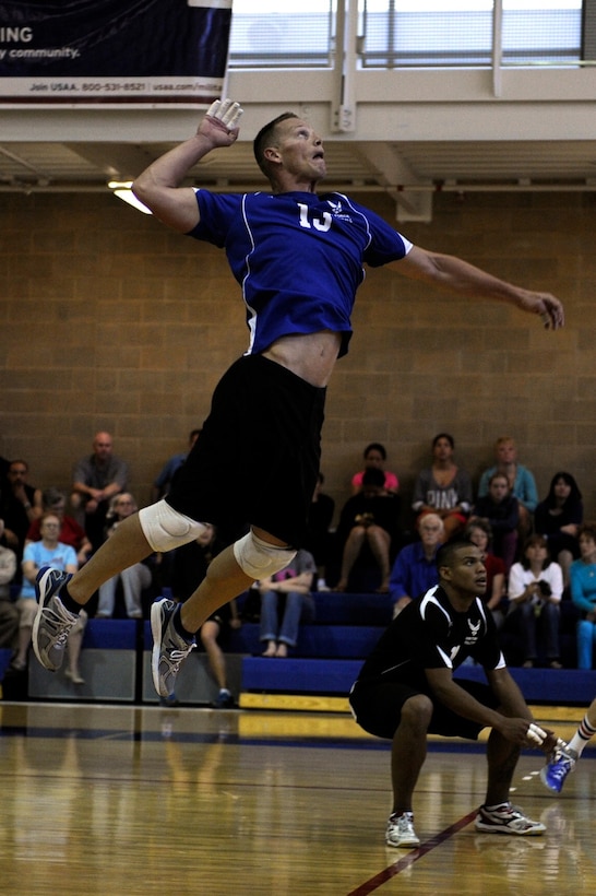 SrA Stuart Sherman (Nellis AFB, NV) demonstrates his power serve.