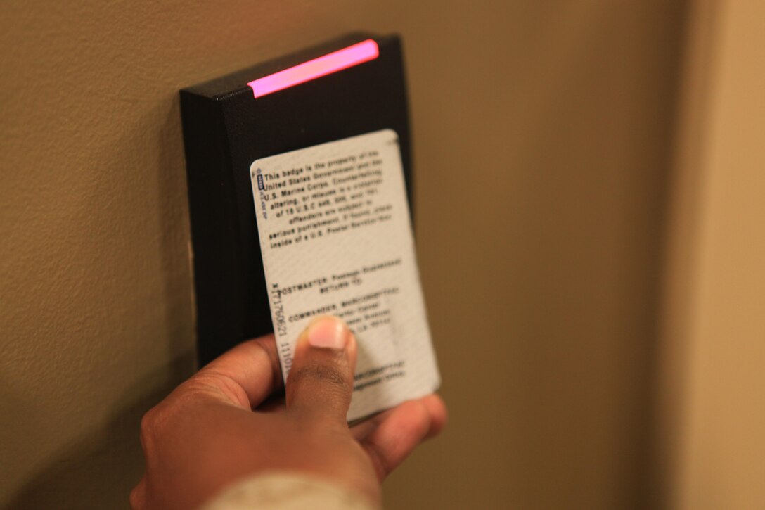 Marine Forces Reserve scored a 100 percent on physical facility security during a recent Command Cyber Readiness Inspection conducted by the Defense Information Security Agency. Marines and civilian staff at Marine Corps Support Facility New Orleans are advised to be vigilant with both physical and cyber security by making sure entry badges are always visible and used when entering and exiting the facility, and to challenge people who do not have a visible badge.