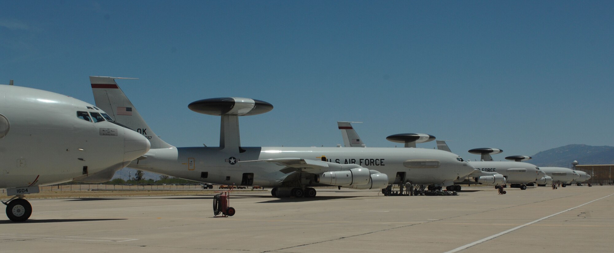 Five E-3 Sentry aircraft await preflight procedures to return to Tinker Air Force Base, Okla., at Davis-Monthan AFB, Ariz. May 21, 2013. Eight aircraft arrived at D-M after inclement weather threatened Tinker AFB, May 20, 2013. (U.S. Air Force photo by Airman 1st Class Betty R. Chevalier/released)