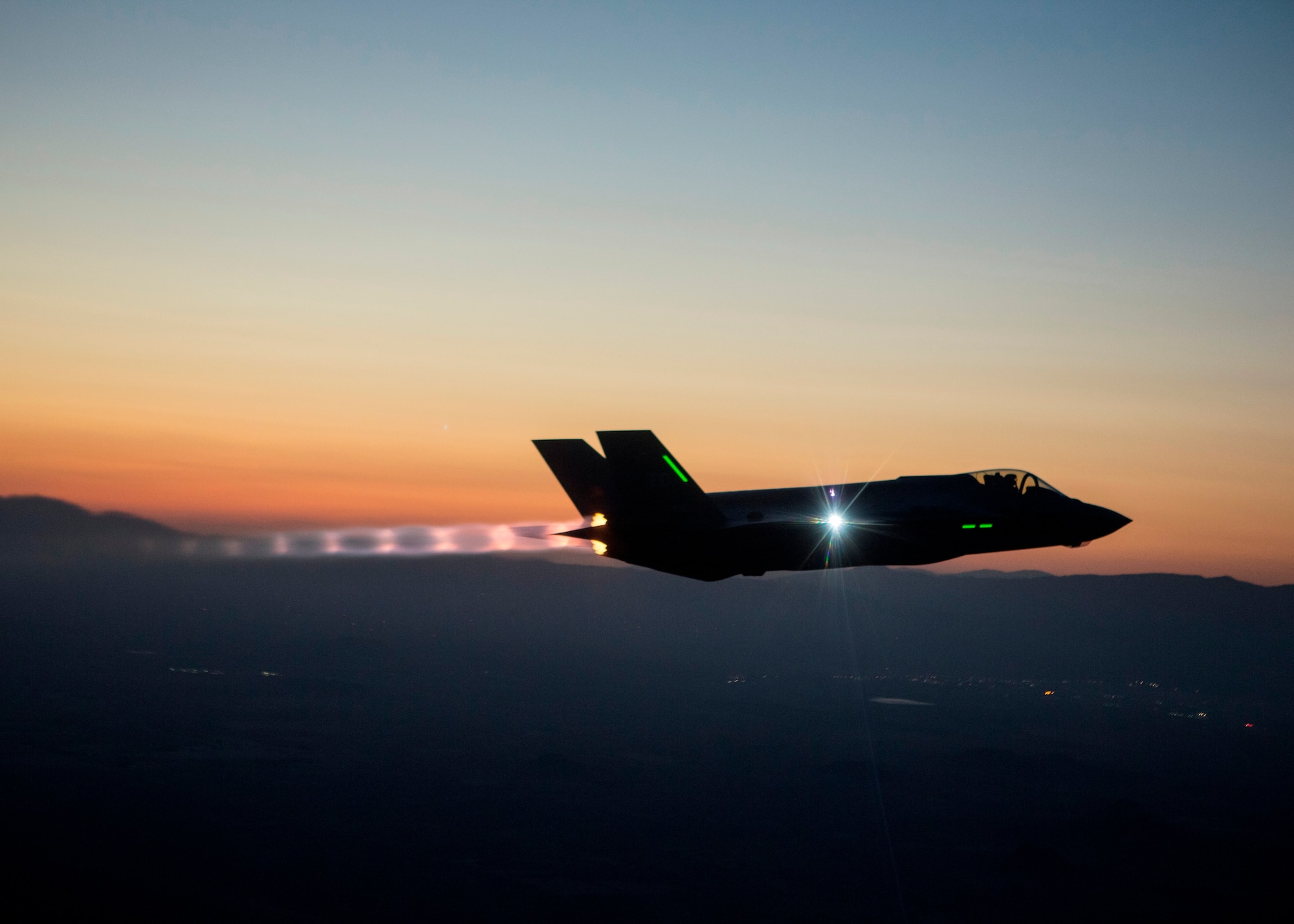 The F-35 Integrated Test Force is completing a series of night flights, testing the ability to fly the jet safely in instrument meteorological conditions where the pilot has no external visibility references. The ITF, which has the lead on all F-35 mission systems testing, is responsible for five of the six night flights. (Courtesy Photo by Tom Reynolds/Lockheed Martin) 