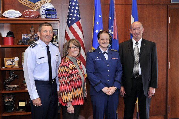 Cadet 1st Class Hannah Dake was named the recipient of the ITA National Arthur Ashe Leadership and Sportsmanship award for the 2012-13 academic year, May 21. (From left to right): Lt. Gen. Mike Gould, Kim Gidley, Cadet 1st Class Hannah Dake, and Dr. Hans Mueh. (U.S. Air Force photo/Raymond McCoy)