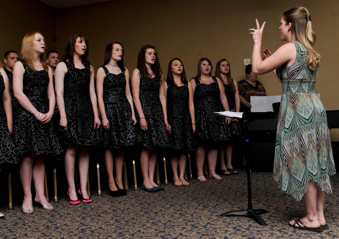 The Douglas High School Choir sang “You Raise Me Up” during the National Prayer Luncheon at the Dakota’s Club on Ellsworth Air Force Base, S.D., May 14, 2013.  Archbishop Timothy Broglio, Archbishop for the Military Services, was the keynote speaker for the event to commemorate National Prayer Day. (U.S. Ai r Force photo by Airman 1st Class Anania Tekurio/Released)