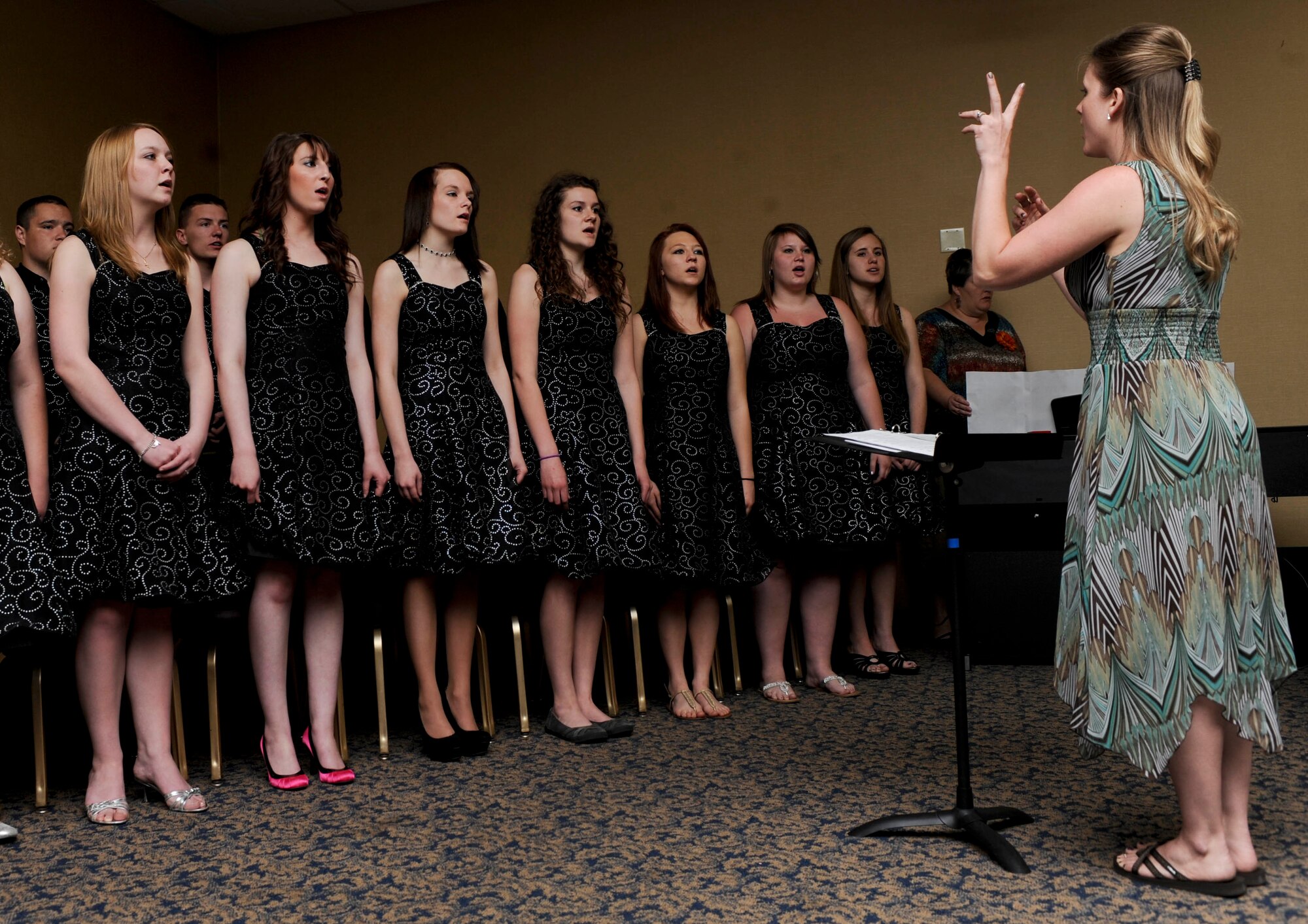 The Douglas High School Choir sang “You Raise Me Up” during the National Prayer Luncheon at the Dakota’s Club on Ellsworth Air Force Base, S.D., May 14, 2013.  Archbishop Timothy Broglio, Archbishop for the Military Services, was the keynote speaker for the event to commemorate National Prayer Day. (U.S. Ai r Force photo by Airman 1st Class Anania Tekurio/Released)