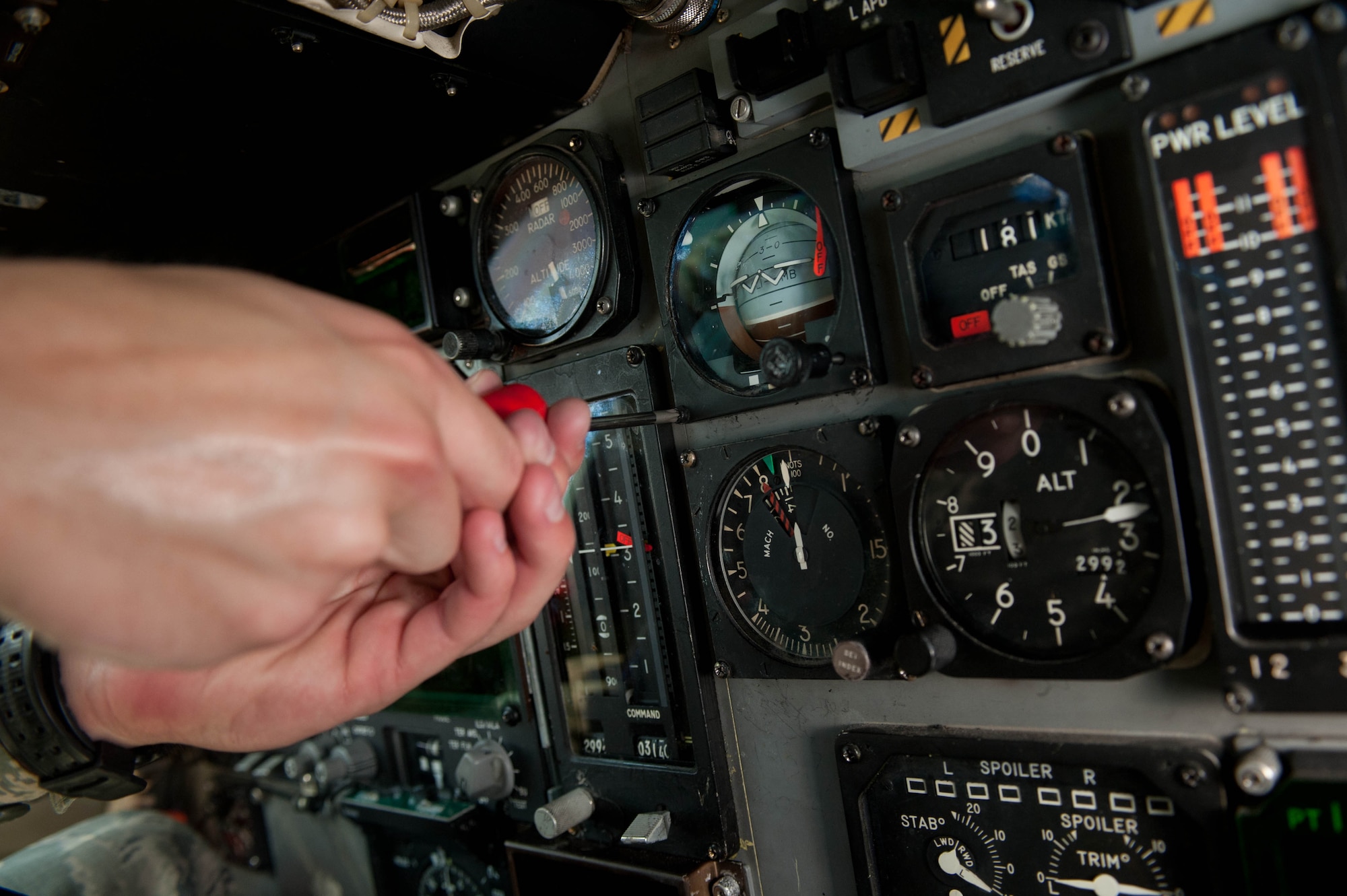 Senior Airman Cody Candrea, 28th Aircraft Maintenance Squadron instrument flight controls technician, adjusts the self contained attitude indicator system in a B-1 cockpit during routine maintenance at Ellsworth Air Force Base, S.D., May 15, 2013. IFC Airmen are tasked to maintain a myriad of mission critical systems on the base’s B-1 bombers, including flight, offensive controls, communications and navigation. (U.S. Air Force photo by Airman 1st Class Zachary Hada/Released)