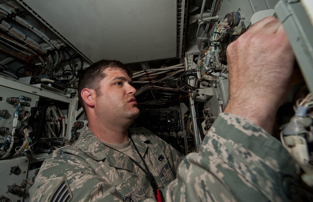 Staff Sgt. Patrick Gesick, 28th Aircraft Maintenance Squadron instrument flight controls lead technician, inspects the central integrated test system in a B-1 bomber during routine maintenance at Ellsworth Air Force Base, S.D., May 15, 2013. The 28th AMXS is the largest squadron in the 28th Bomb Wing, with more than 700 Airmen supporting Ellsworth’s combat coded B-1 bombers. (U.S. Air Force photo by Airman 1st Class Zachary Hada/Released)