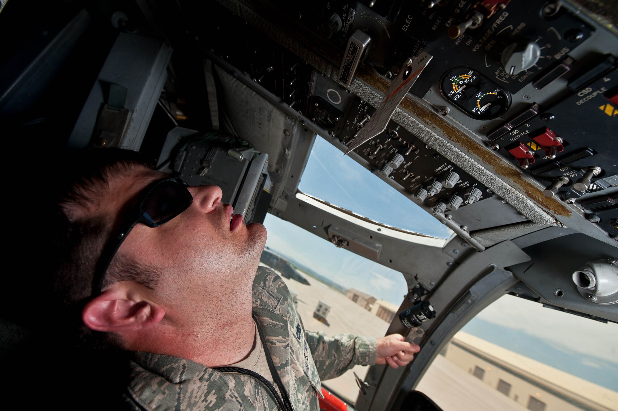 Staff Sgt. Patrick Gesick, 28th Aircraft Maintenance Squadron instrument flight controls lead technician, checks the hydraulic quantity and pressure in a B-1 bomber cockpit during routine maintenance at Ellsworth Air Force Base, S.D., May 15, 2013. IFC Airmen are tasked to maintain a myriad of mission critical systems on the base’s B-1 fleet, including flight and offensive controls, communications and navigation. (U.S. Air Force photo by Airman 1st Class Zachary Hada/Released)