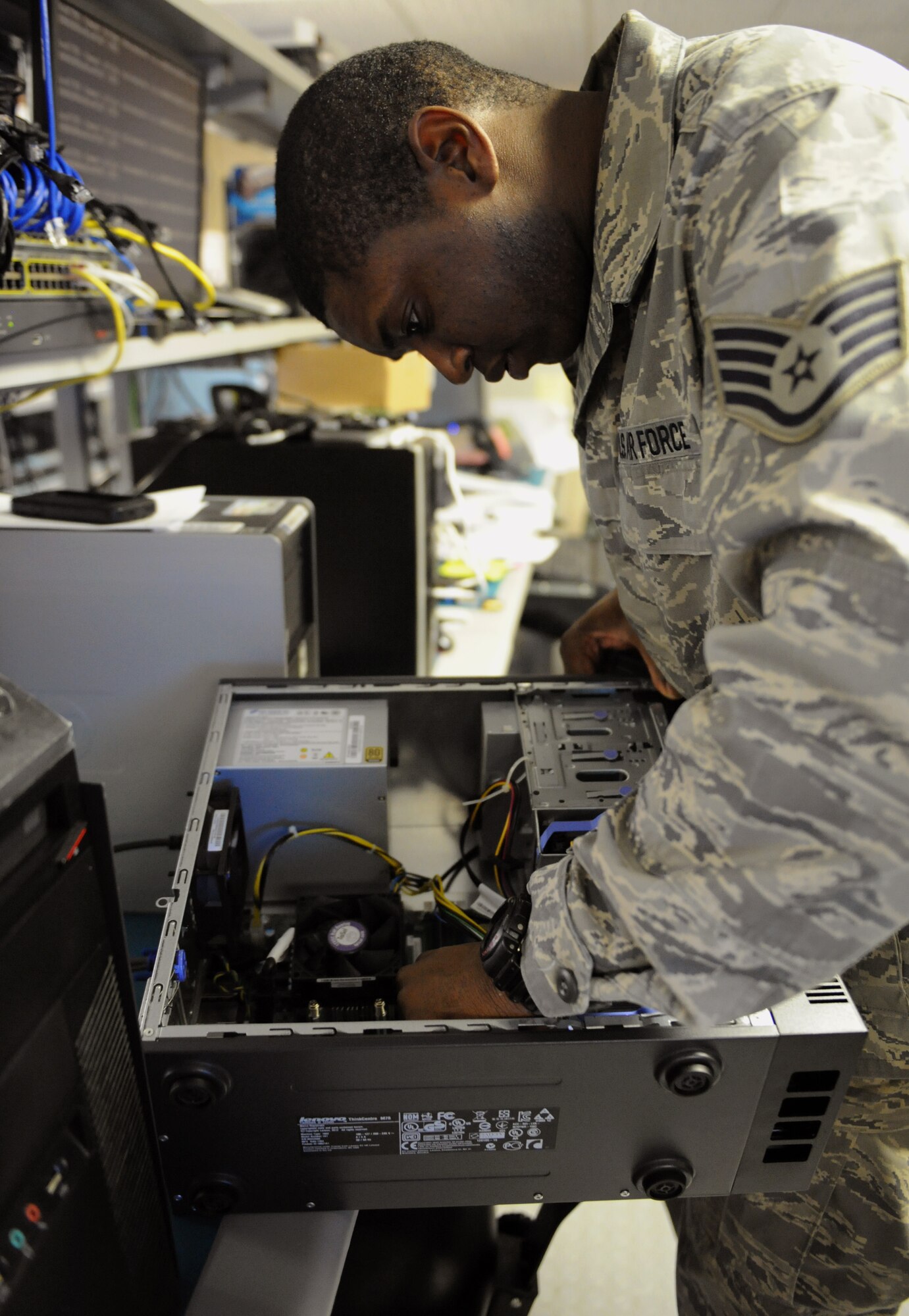 Staff Sgt. Gregory Green, 2nd Communications Squadron client service center, verifies the amount of random access memory inside a computer on Barksdale Air Force Base, La., May 21, 2013. The CSC maintains all electronics used by base personnel including computers, cell phones, radios and hard drives. (U.S. Air Force photo/Airman 1st Class Benjamin Gonsier)