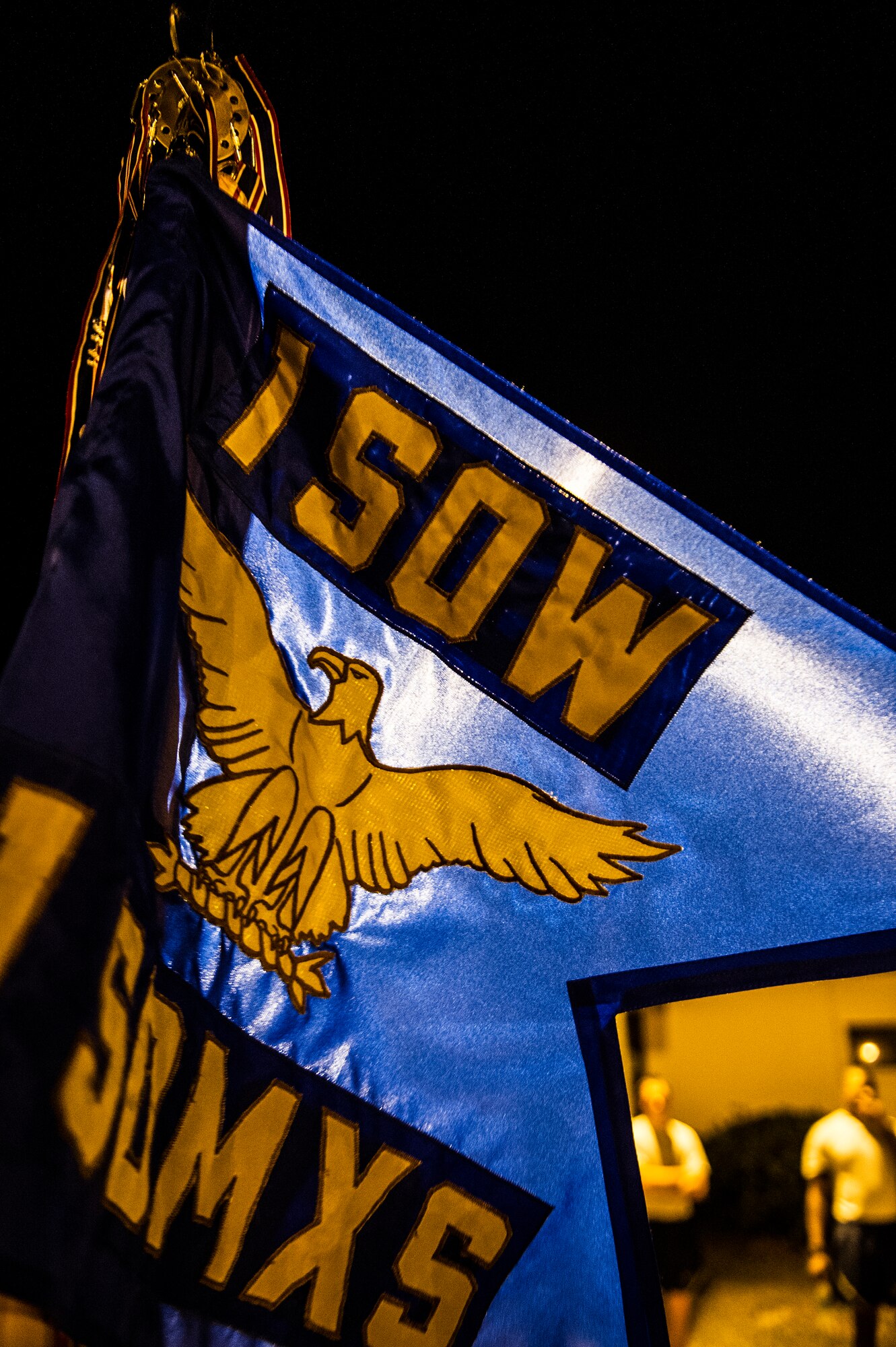 The 1st Special Operations Maintenance Squadron flag waves in the air before an early morning run from Elgin Air Force Base to Hurlburt Field AFB, Fla., May 20, 2013. The 1st SOMXS and 9th Special Operations Squadron are moving to Hurlburt Field after been stationed on Eglin for more than 20 years. (U.S. Air Force photo/Airman 1st Class Christopher Callaway) 